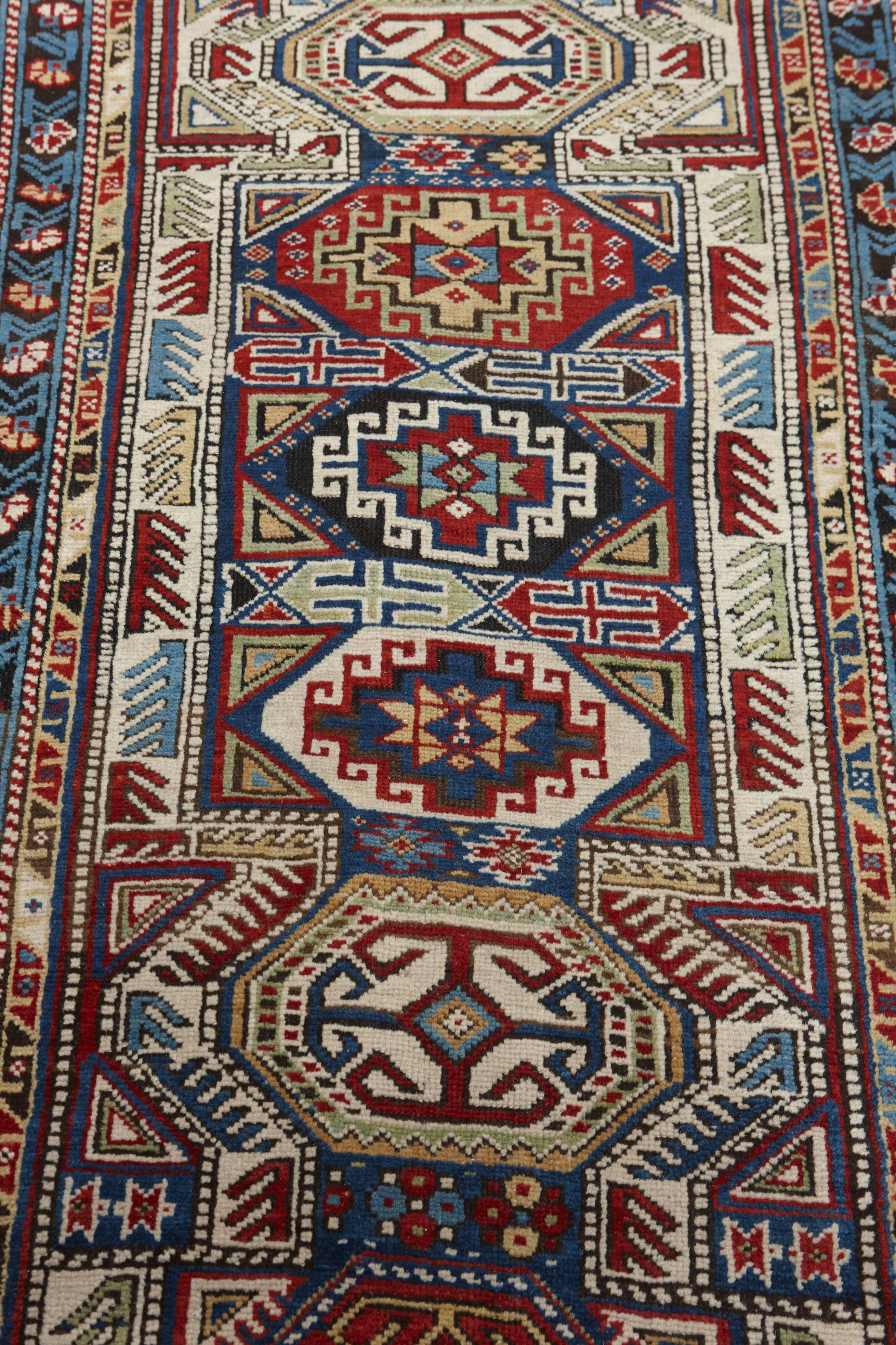 One of the most exemplary Kazak weaves we witnessed in our 50+ years of antique rug dealing! 

Tremendously fine and compactly woven, the warps and wefts give an impression of a finer weaving style at first glance, yet closer inspection reveals