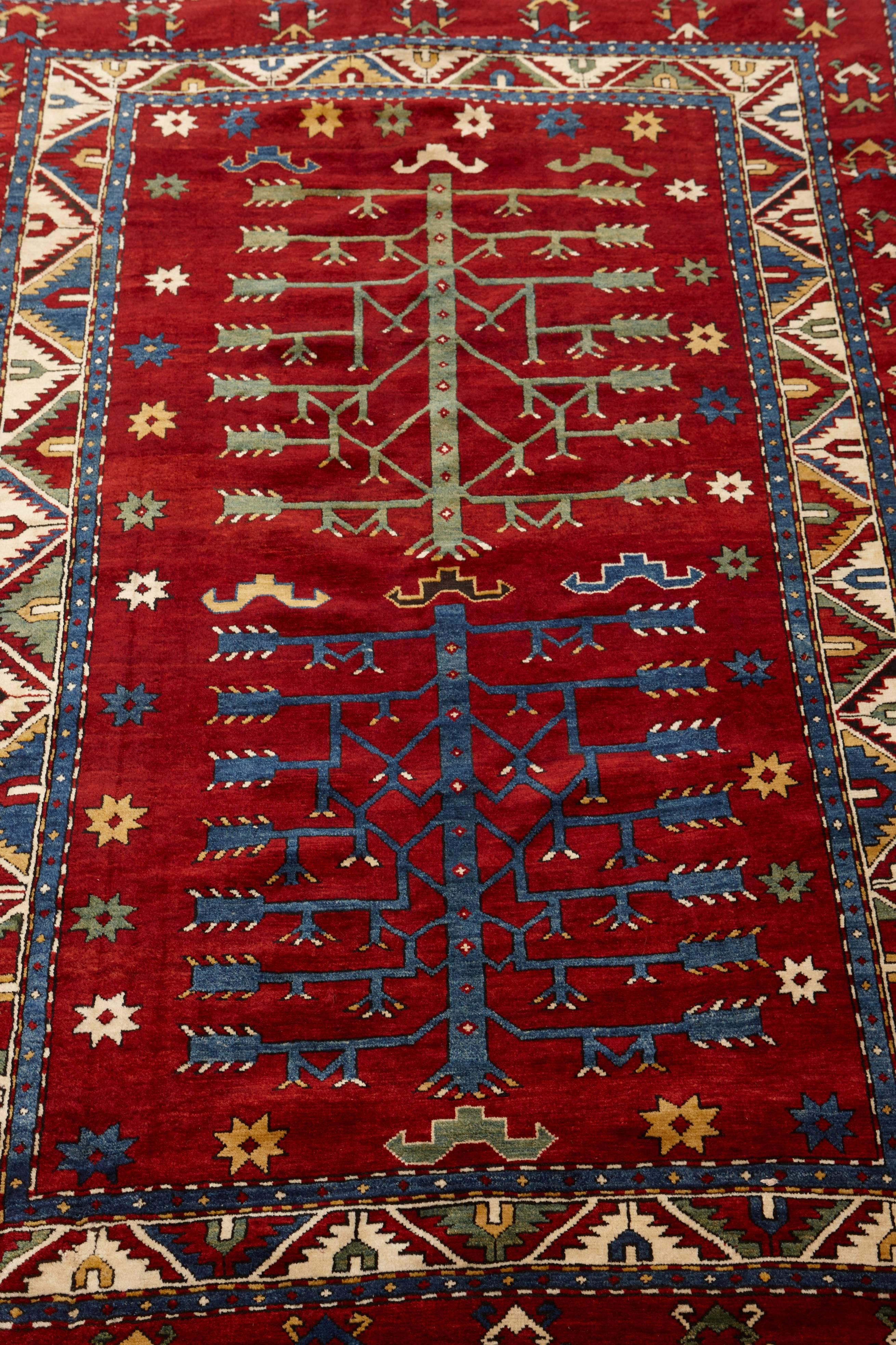 A highly prized large-sized antique Tree of Life Kazak carpet.

An ancient symbol in Urartu (the ancient proto-Armenian kingdom), the tree of life is often found in older Armenian rugs, drawn onto the exterior walls of fortresses, and carved onto