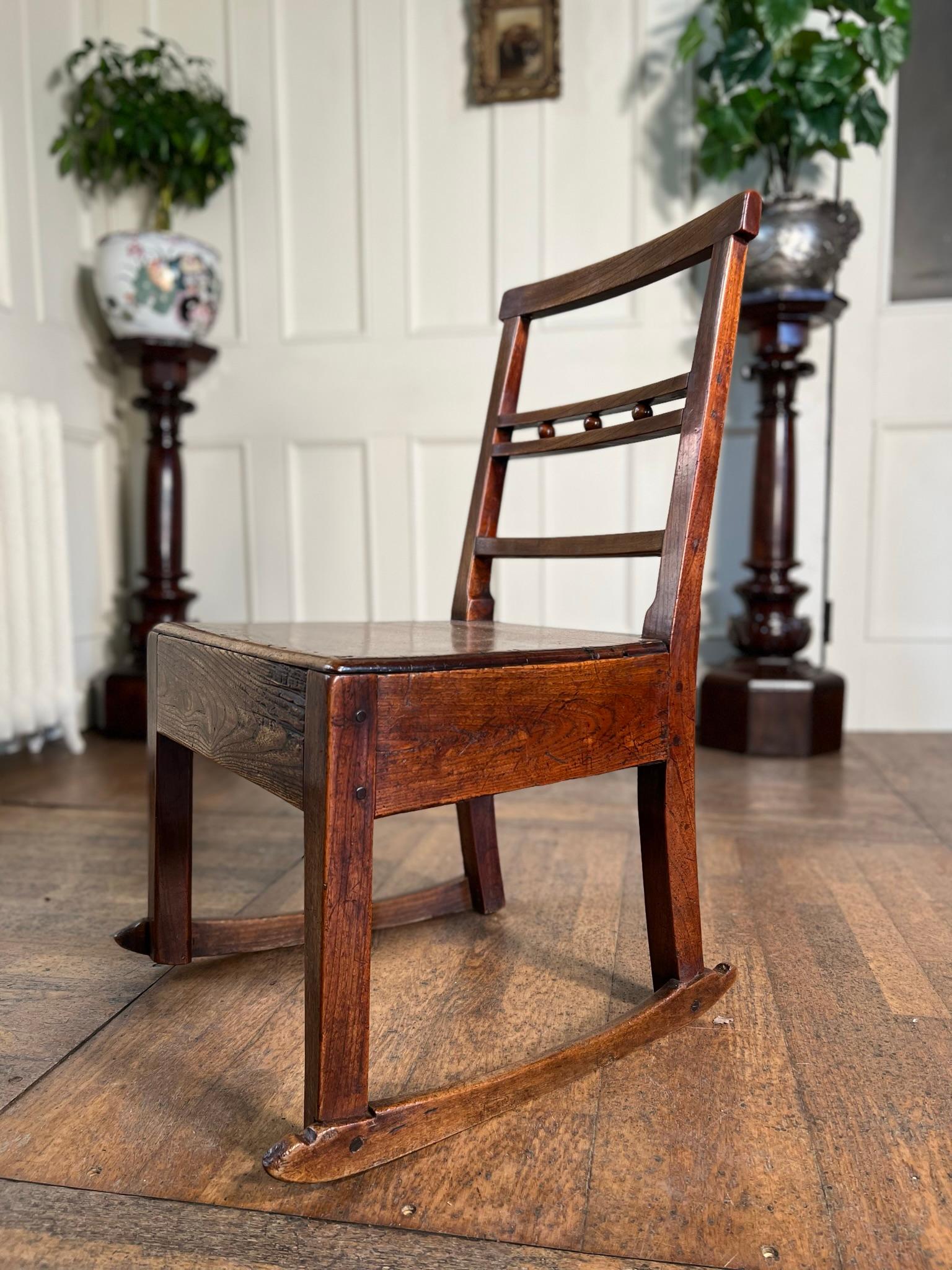 19th Century East Anglian button back rocking chair.

Good, solid useable condition.

Some signs of historic worm.

One rail seems to have been replaced at some point in its history.

Measurements: 81cm H / 41cm H seat x 47cm W x 40cm