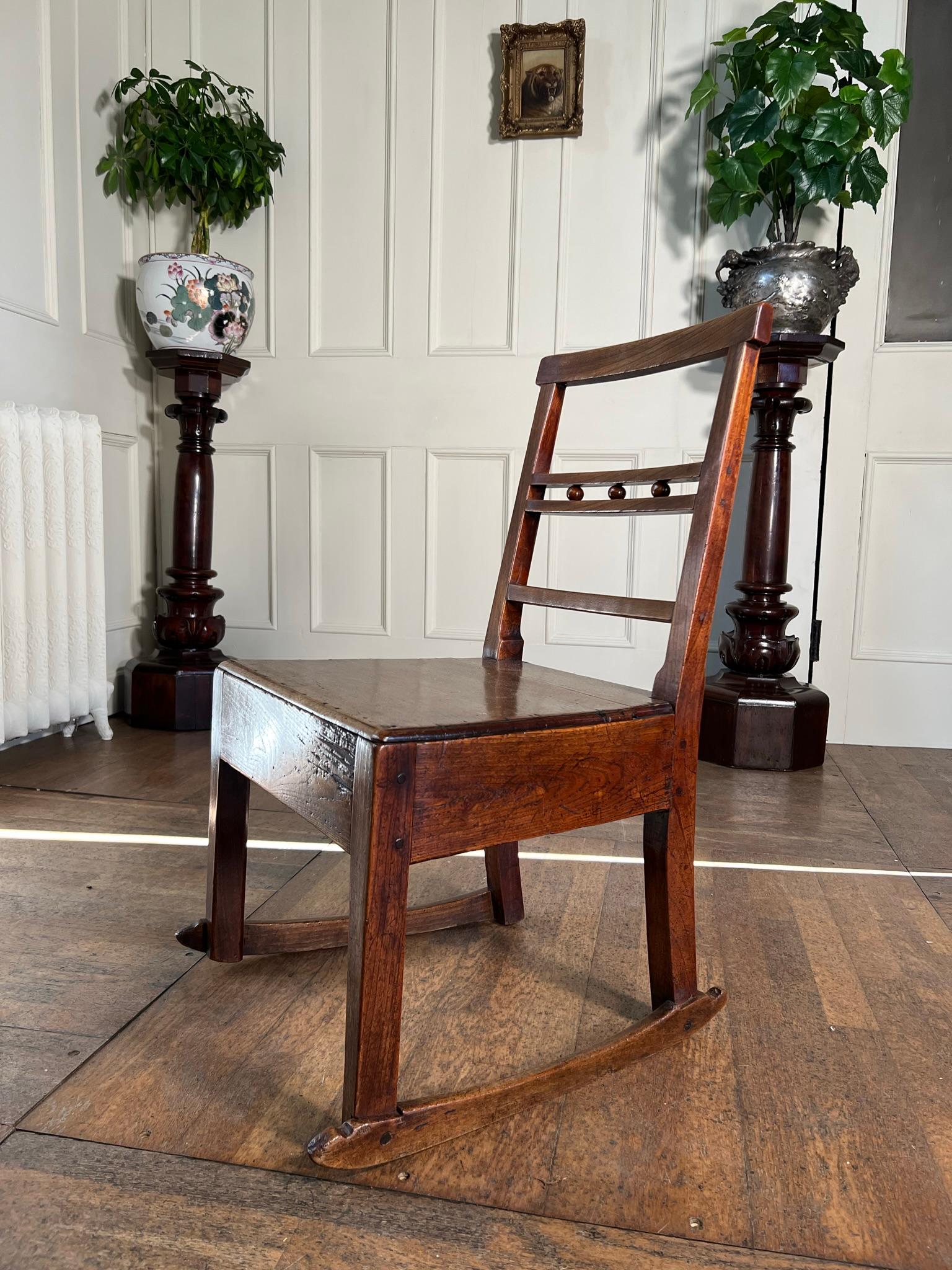 English 19th Century East Anglian Button Back Rocking Chair