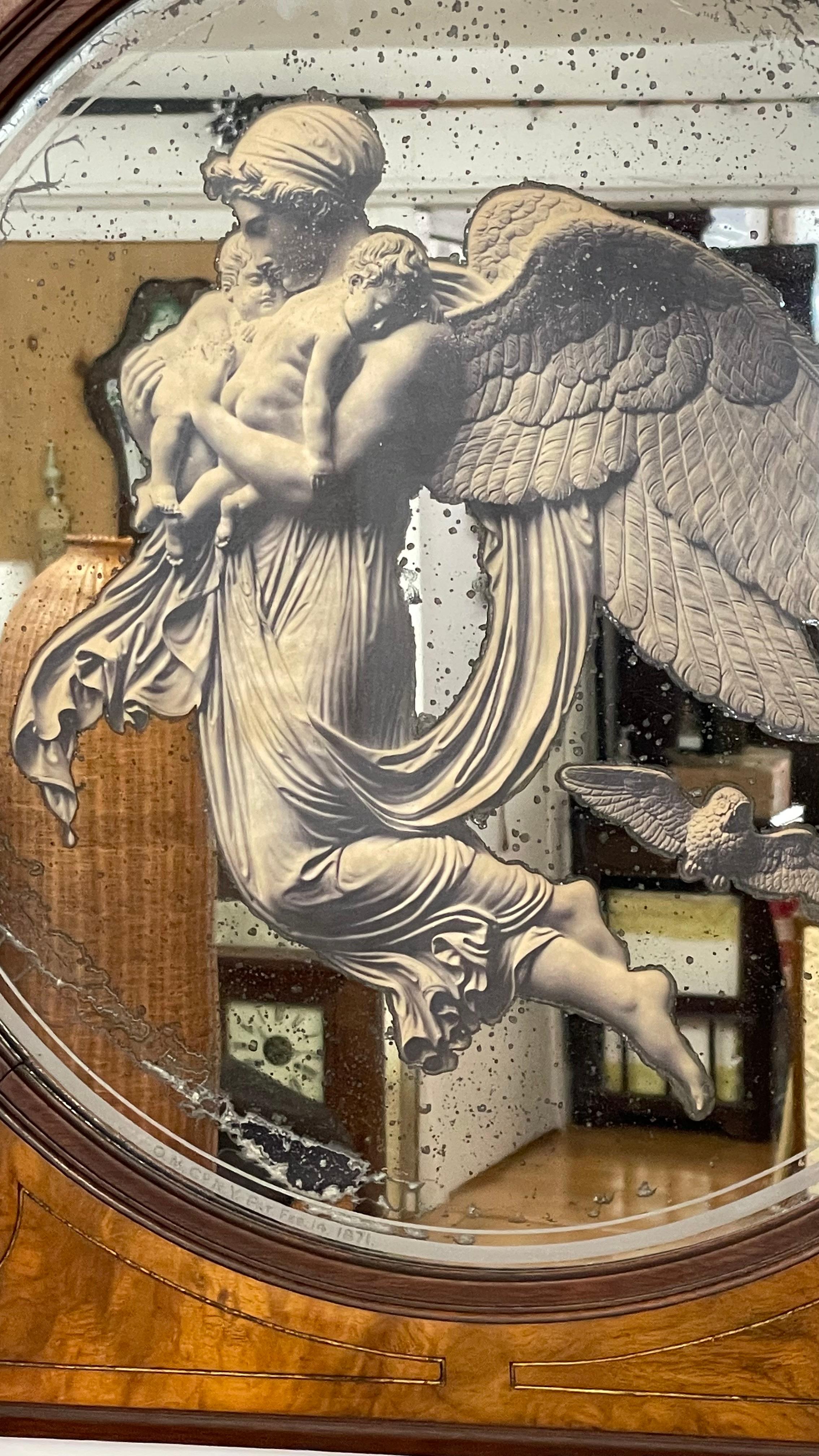 19th century Eastlake mirror with reverse painting of angel

22 x 22