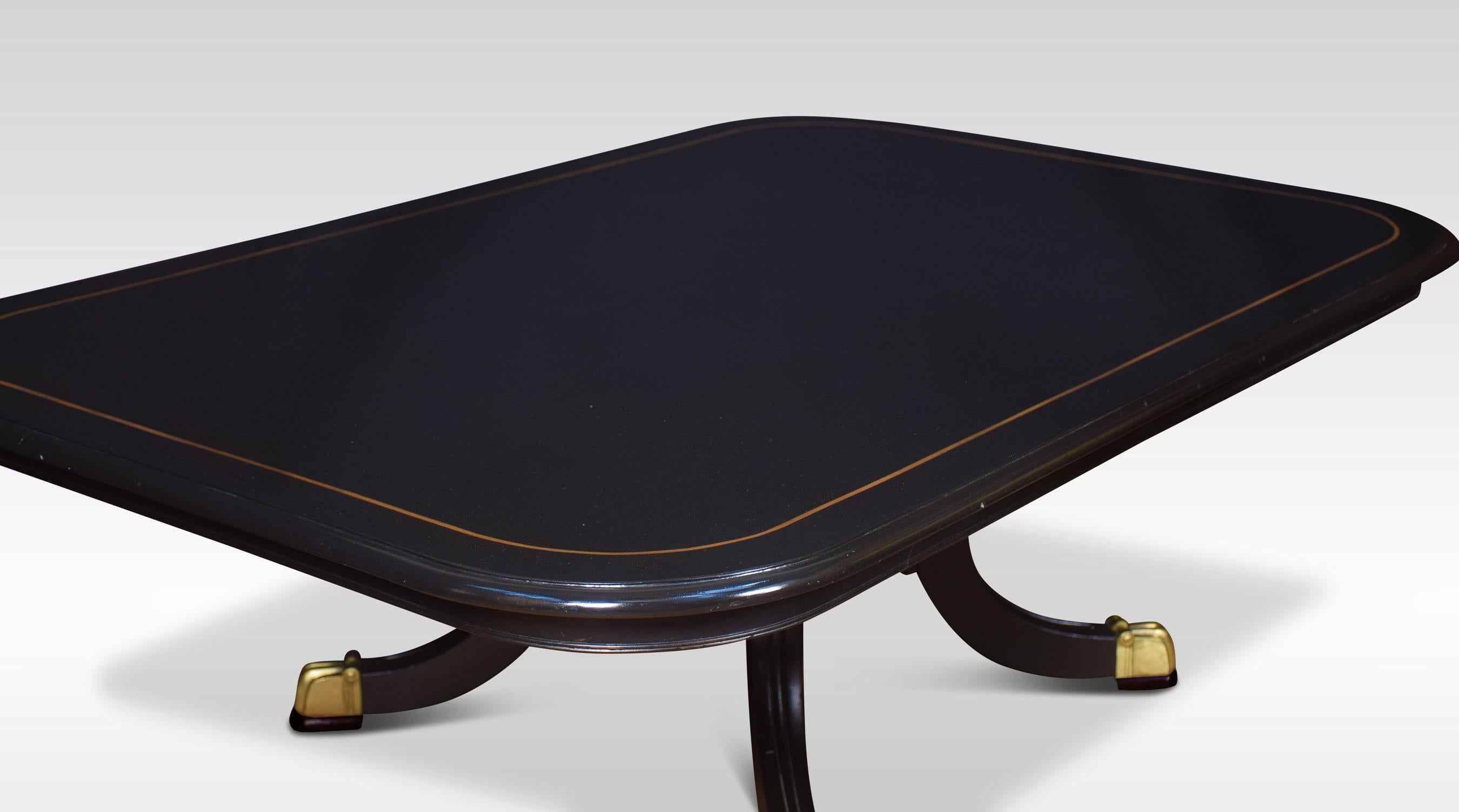 19th century ebonized coffee table, the rectangular top with gilt line decoration. Raised on a pedestal base and four outswept legs. This table has been reduced to coffee table height
Dimensions:
Height 19 inches
Length 60.5 inches
Width 40.5