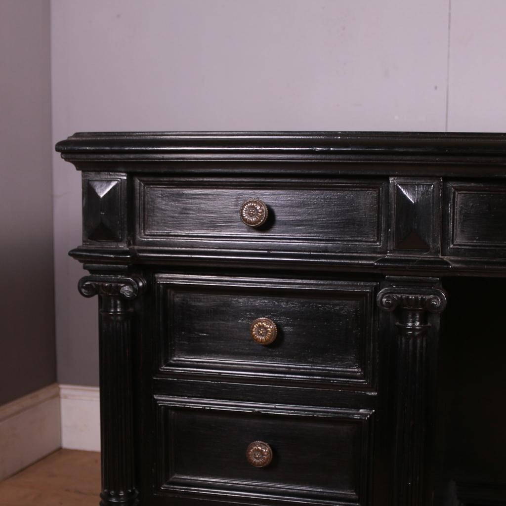 Stunning 19th C German ebonised 9 drawer desk with fully paneled back.

Kneehole dimensions