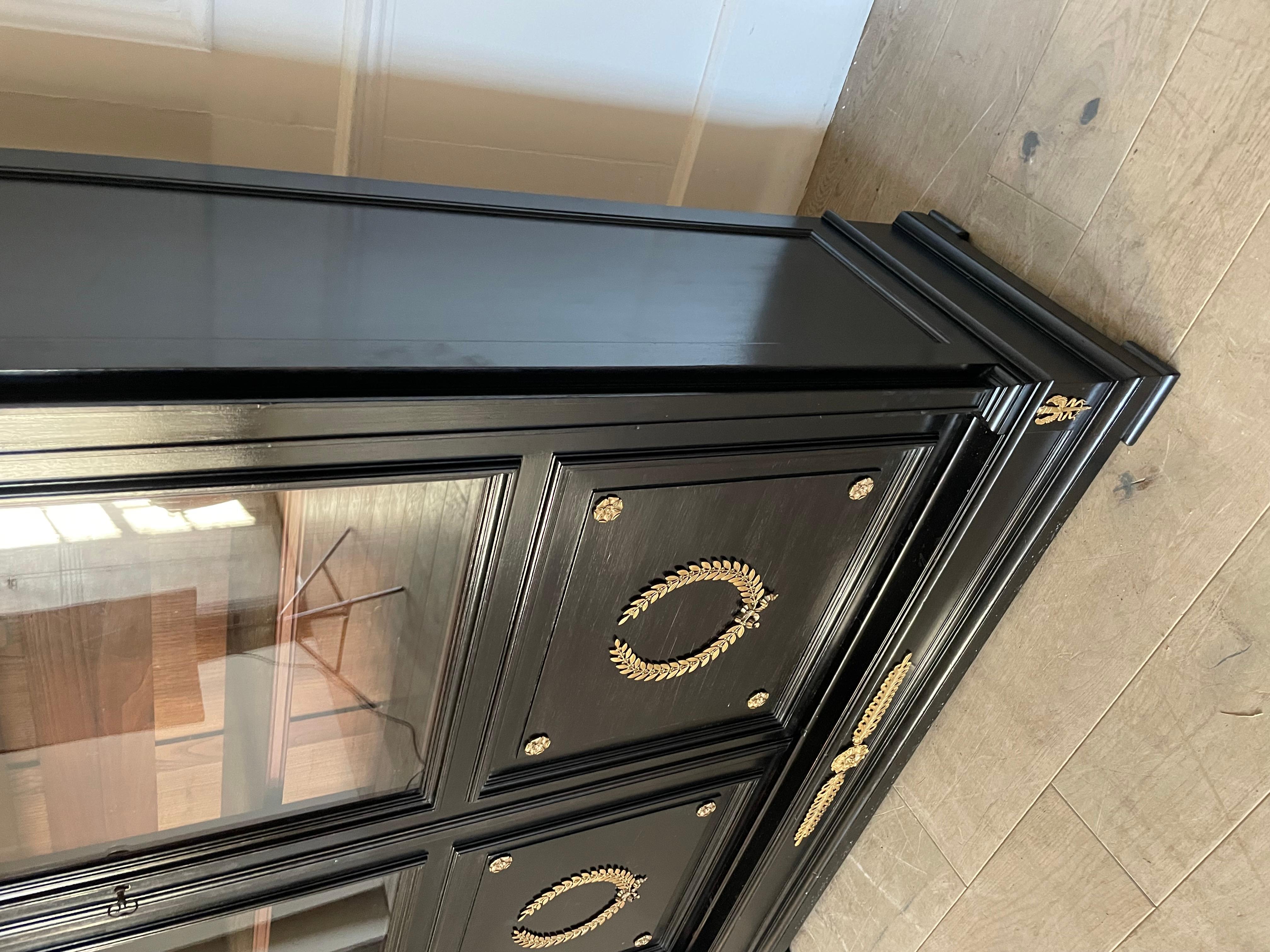 Ebonized 19th century ebonised empire style bookcase