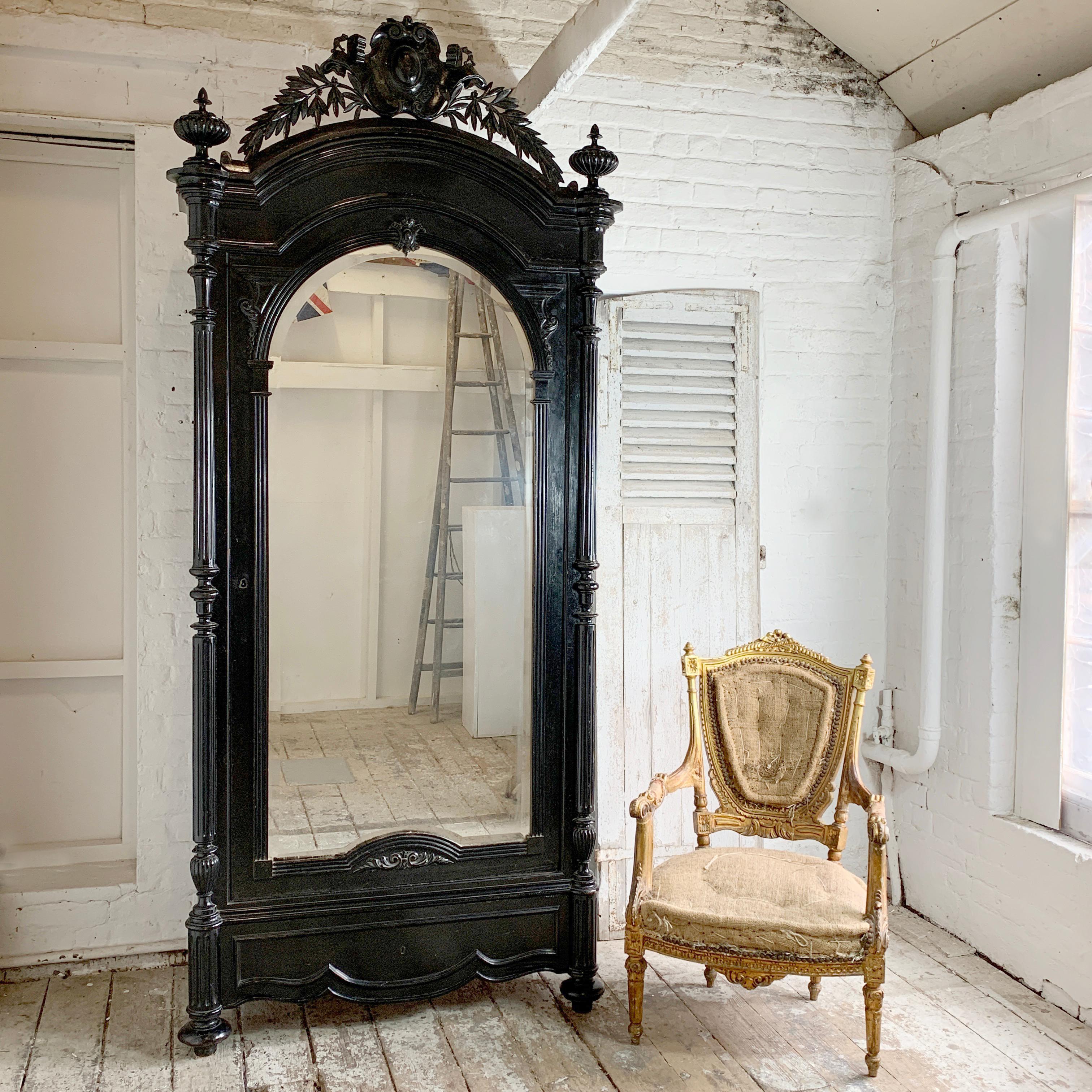 19th century French Gothic Armoire
This impressive large Armoire is decoratively hand carved in a Gothic style
Dating from the mid-19th century
French
Black in color, original ebonized finish with some overlayed wax/varnish finish in places
The