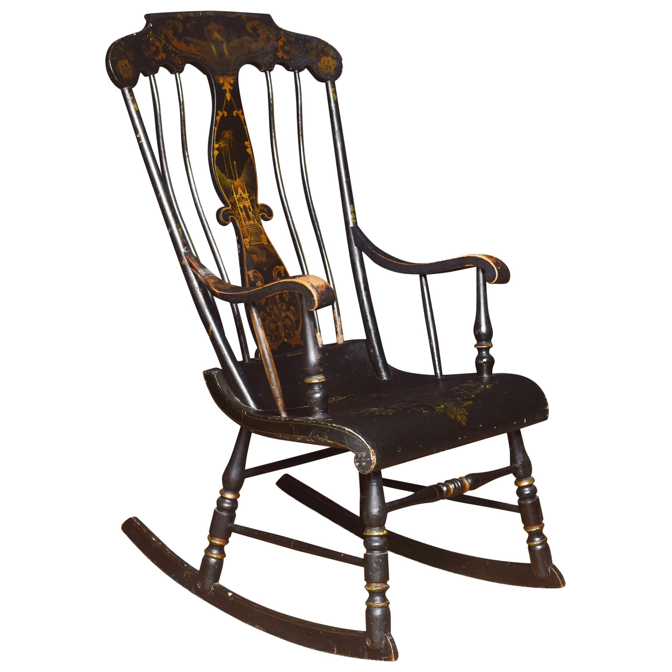Chaise à bascule du 19e siècle, ébonisée et peinte en doré