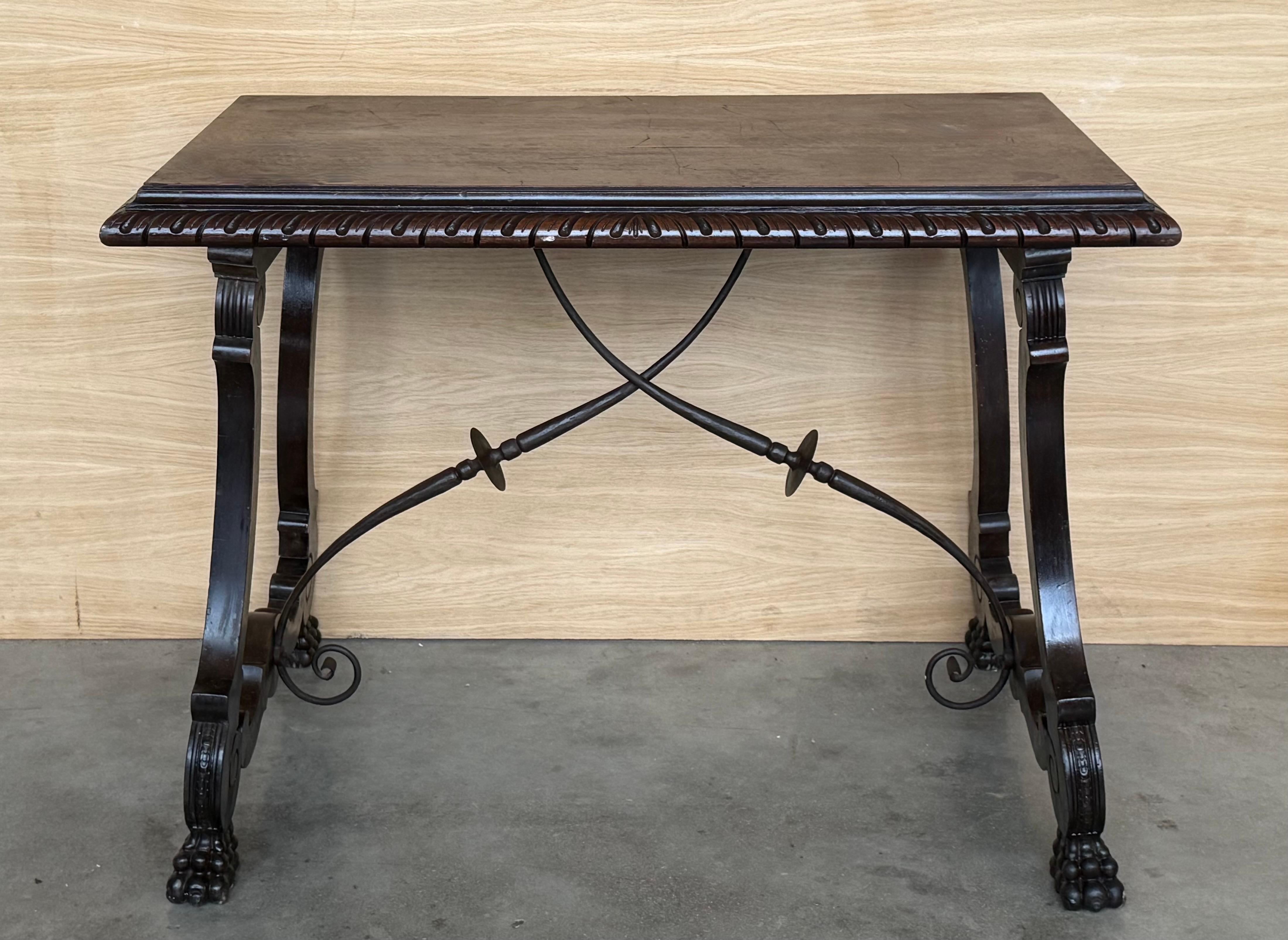 Carved 19th Century Ebonized Baroque Spanish Side or Desk Table with Lyre Legs For Sale
