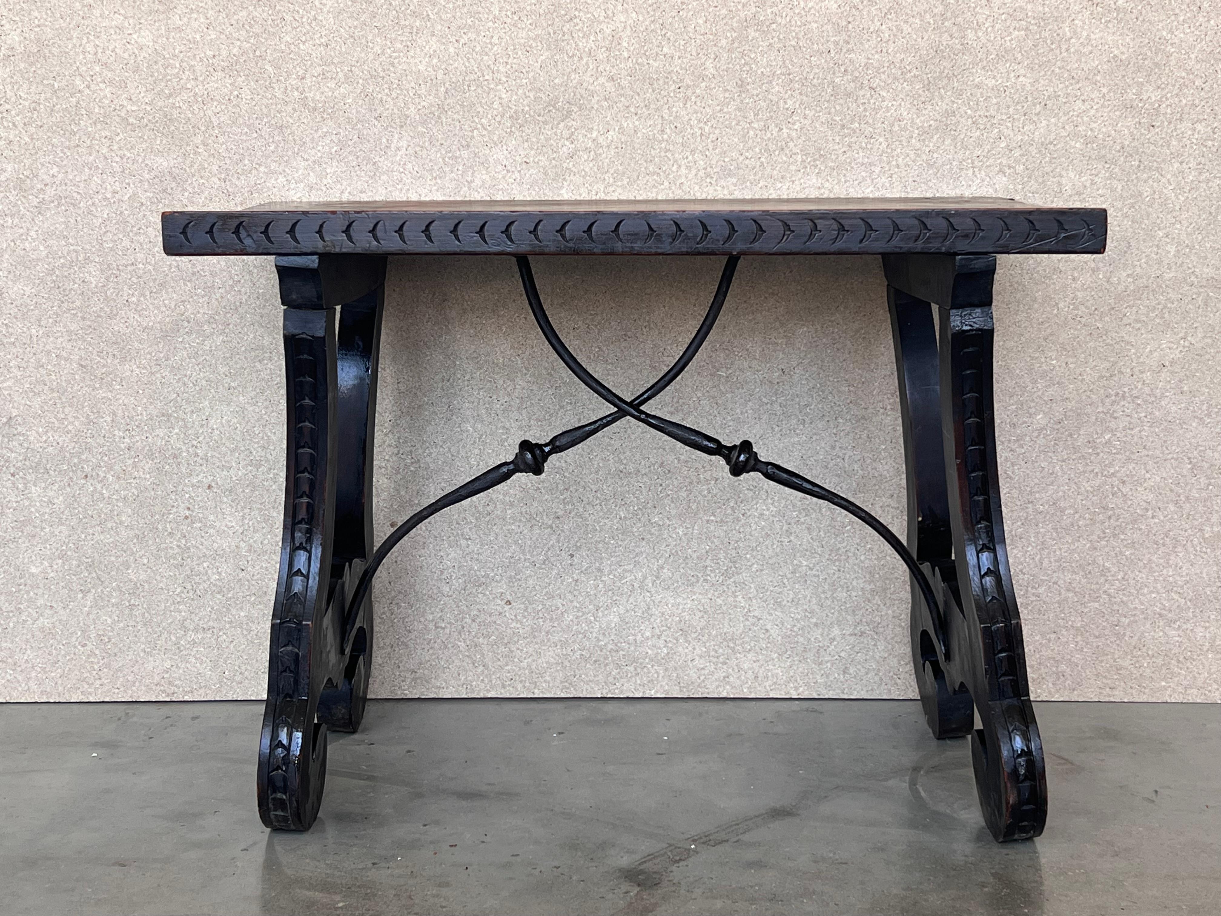 Spanish Colonial 19th Century Ebonized Baroque Spanish Side Table with Lyre Legs For Sale