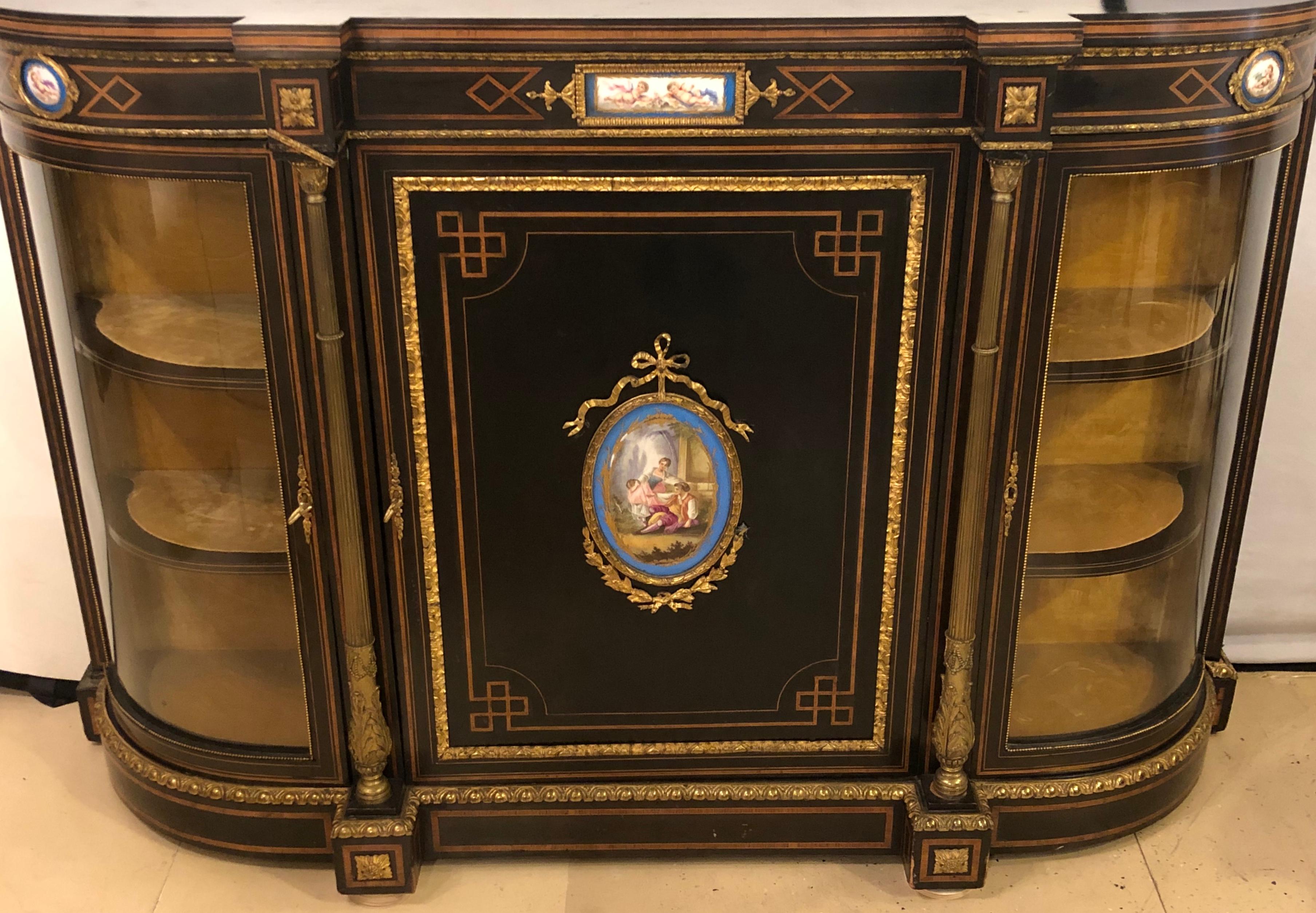 19th century ebonized bronze mounted sideboard with Sevres plaques. Stamped Brew & Claris Manufacturers in London. Second Empire-style Ebonized Mahogany and Ormolu- and Porcelain-mounted étagère, Brew and Claris, England, mid-19th century, the case