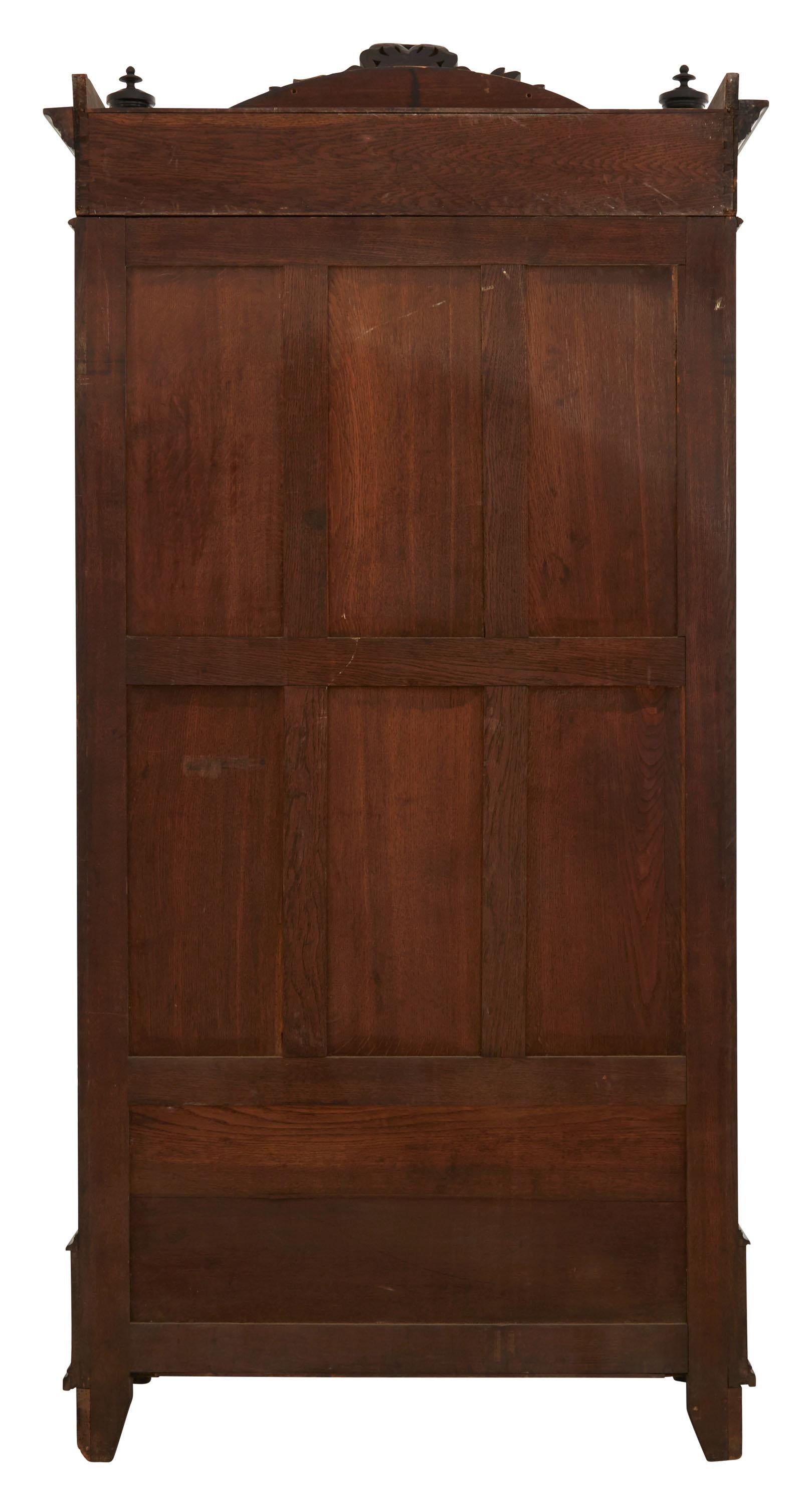 19th Century Ebonized Carved Wood Armoire In Good Condition In Chicago, IL