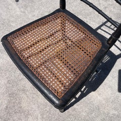 Silla auxiliar con asiento de caña de bambú sintético ebonizado del siglo XIX