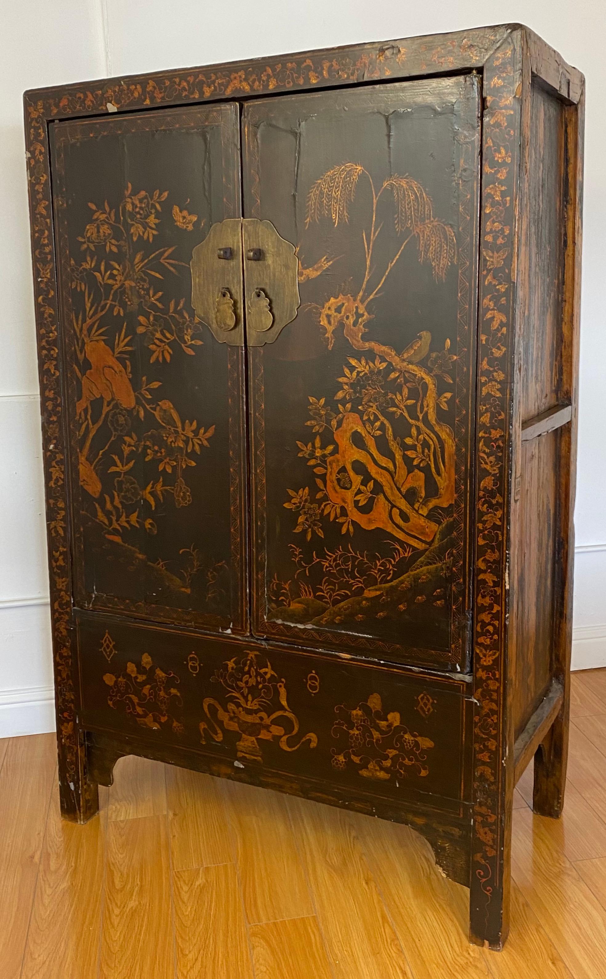 19th century ebonized Chinese Tansu cabinet.

Antique cabinet with single shelf and a lower hidden space

Measures: 43