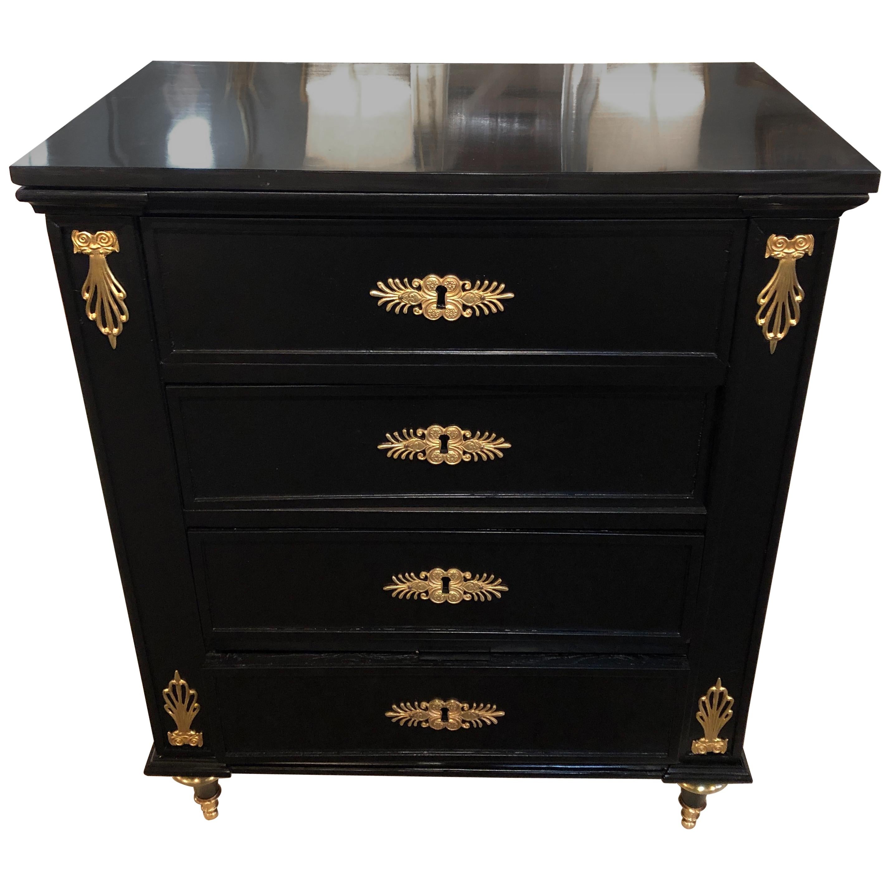 19th Century Ebony Bronze Mounted Four-Drawer Commode with Black Marble-Top