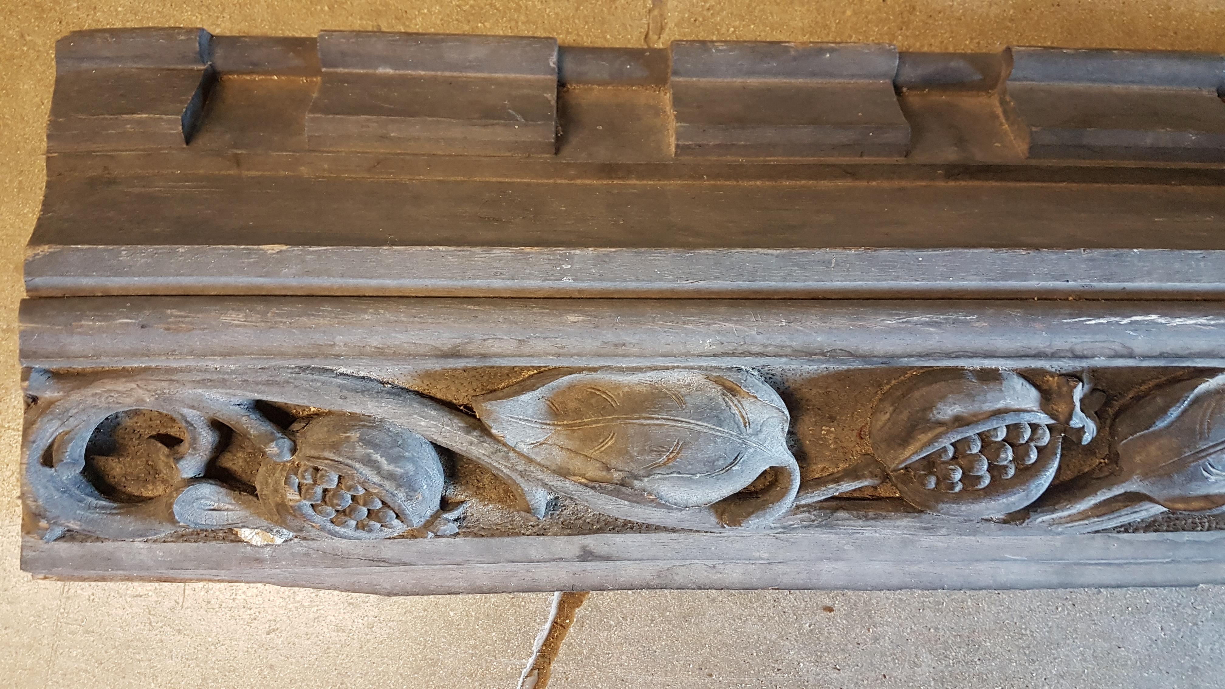 A charming large carved ecclesiastical oak beam carved with pomegranates along its length with the latin word 'Sacrificabo'. This beam is mid Victorian and in solid oak with great natural weathering and a dry finish. Has a good rustic look to it and