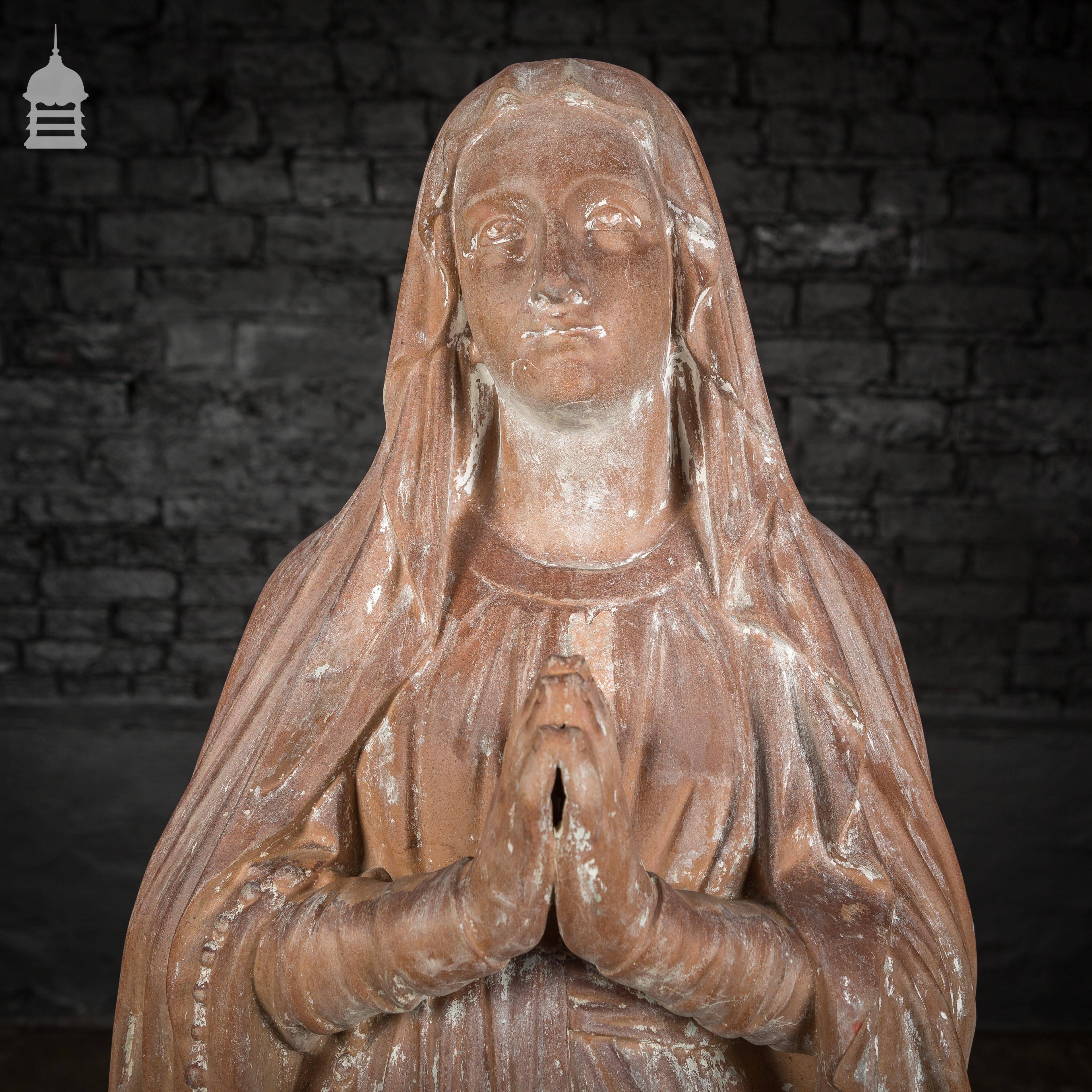 19th century ecclesiastical terracotta statue of Mary

Measures: Height 1190 mm, 47”
Width 300 mm, 11.75”
Depth 300 mm, 11.75”.