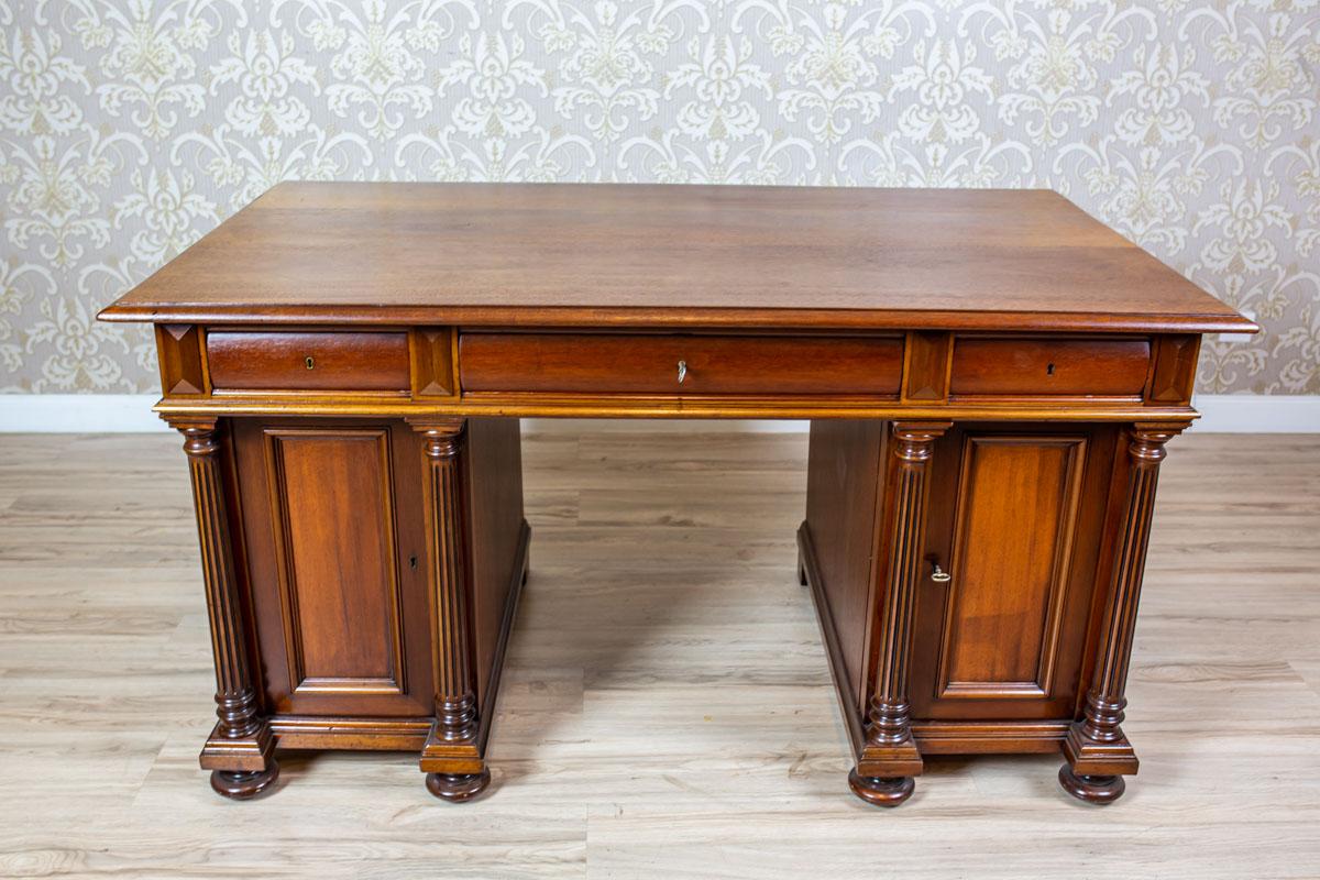 We present you a desk from fourth quarter of the 19th century.
The base is composed of two cabinets, which can be locked with the door.
All topped with a desktop and its integral part consisting of three drawers.
The door fronts are flanked by