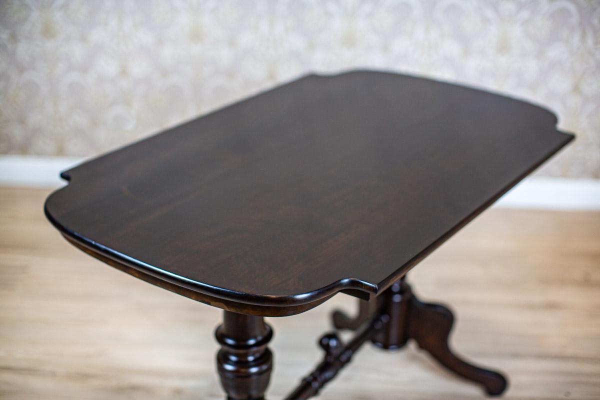 19th Century European Eclectic Walnut Living Room Table in Black

We present you this piece of furniture made of walnut wood and veneer.
It is from the period of the German Empire (Q4 of the 19th century).
The rectangular table with rounded corners