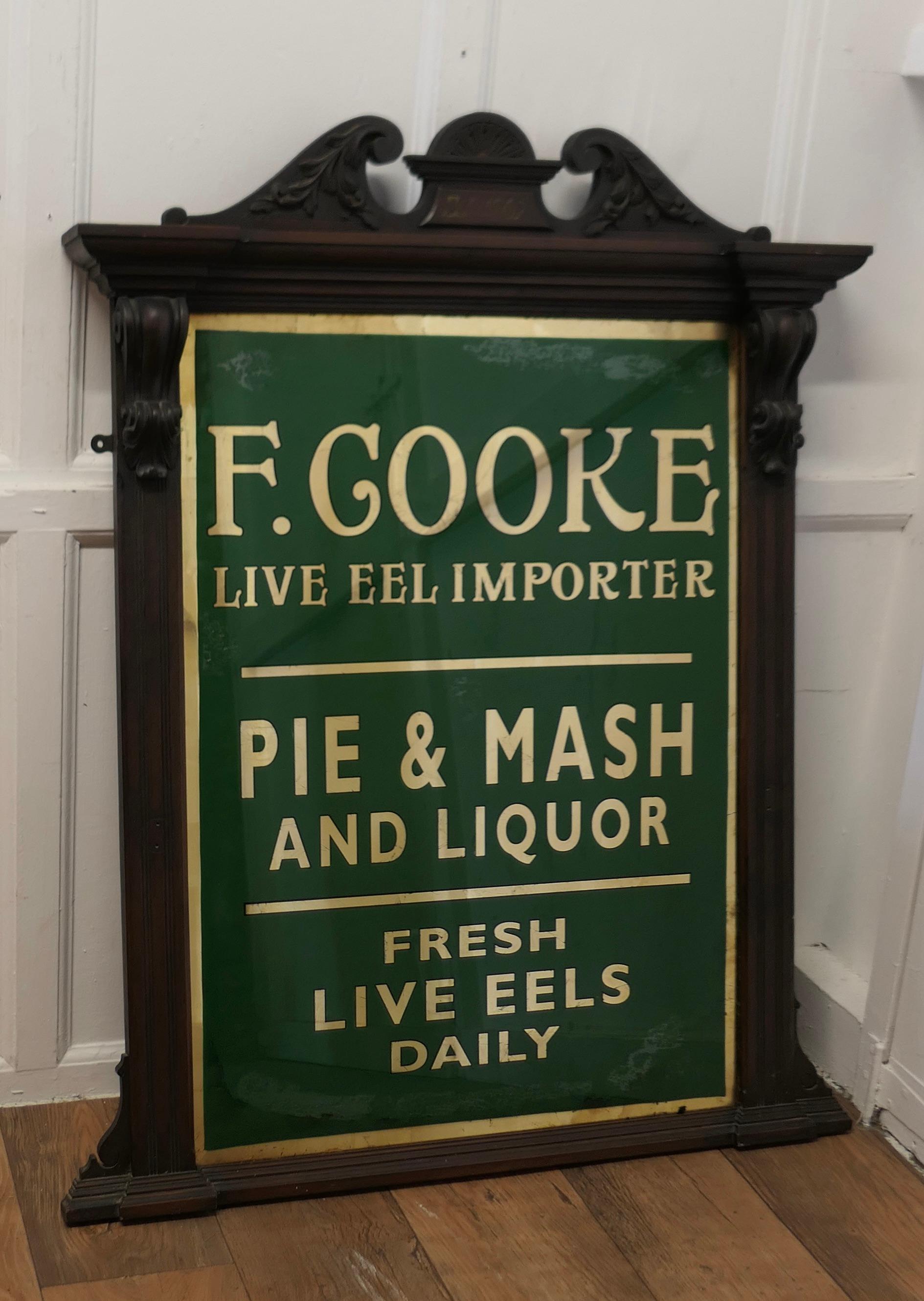  19th Century Eel and Pie Shop Advertising Wall Mirror Sign

The Mirror Glass is Green with Gold Leaf Lettering on the reverse 

The Glass is in quite good condition with some very minor blemishes on the reverse side, it is set in a Carved Frame