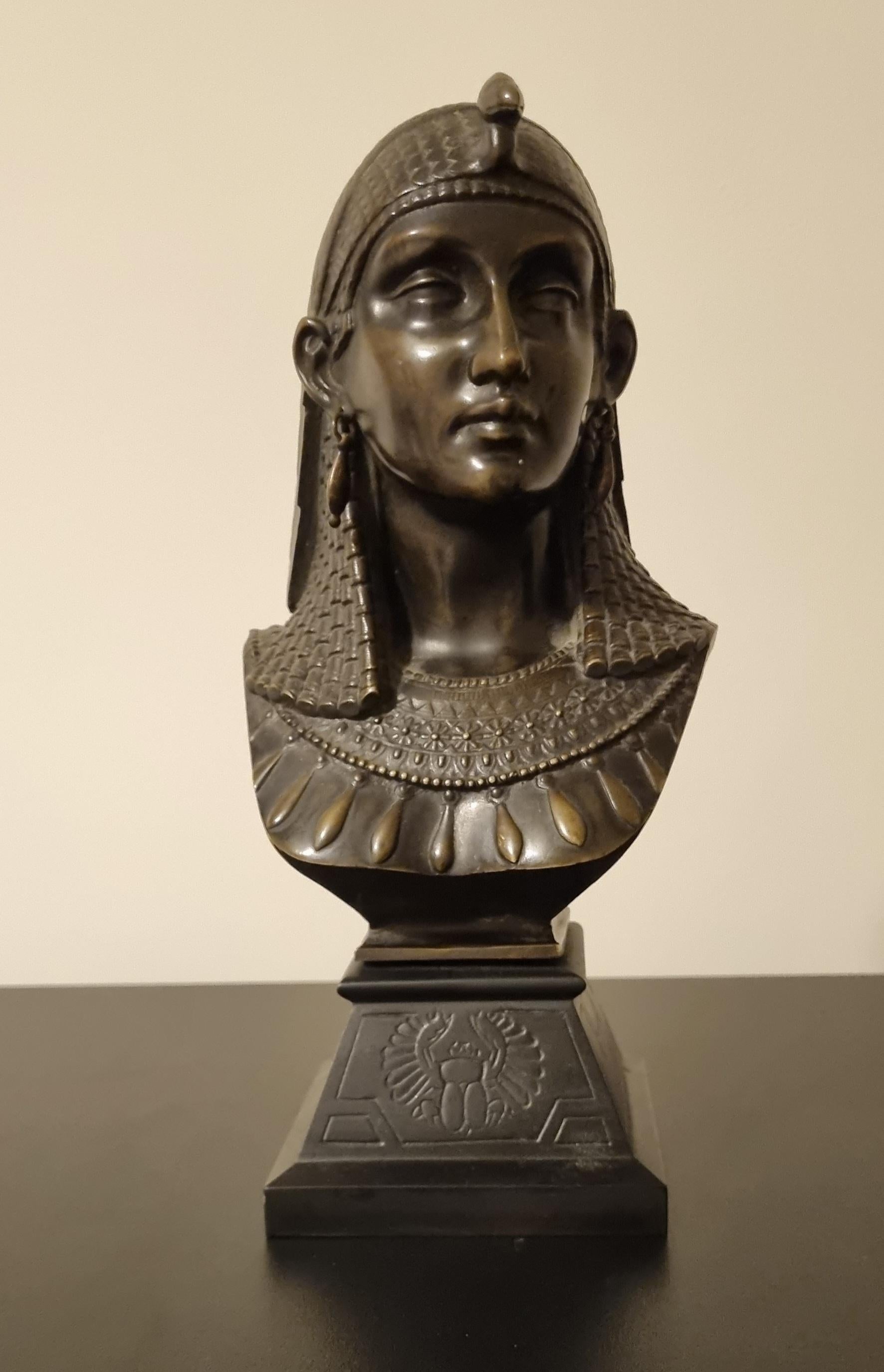 A beautiful 19th-century Egyptian Revival bronze bust, signed by Paul Auguste Gagne, a French artist known for exhibiting at the Paris Salons from 1865.

Wonderfully detailed and full of character, this piece captures the charm of the Egyptian