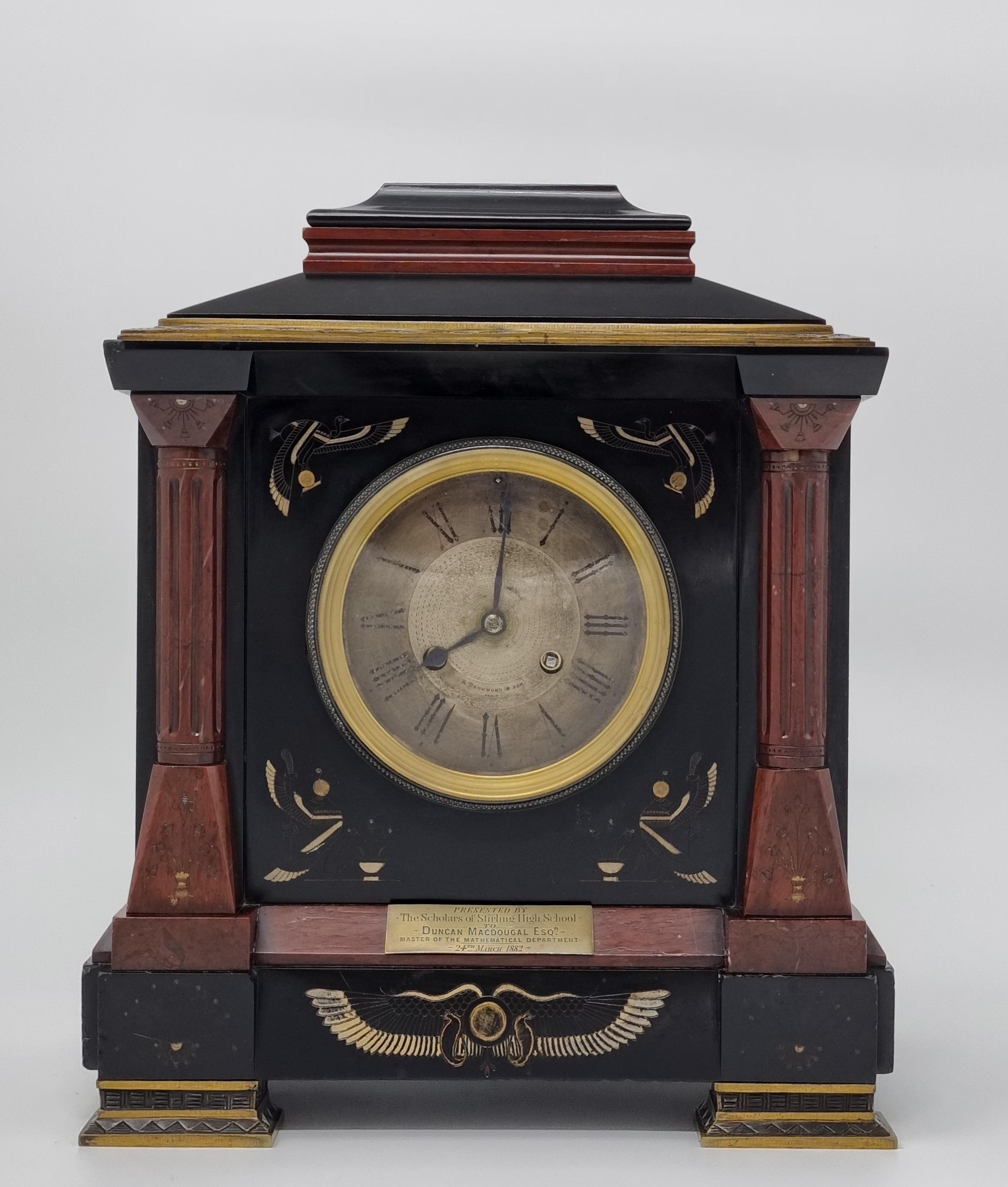 A highly unusual 19th Century Egyptian Revival Mantel Clock. Wonderful design architectural clock case with pagoda top, made of high quality red marble and black slate, all exquisitely decorated with bronze mouldings and hieroglyphics depicting