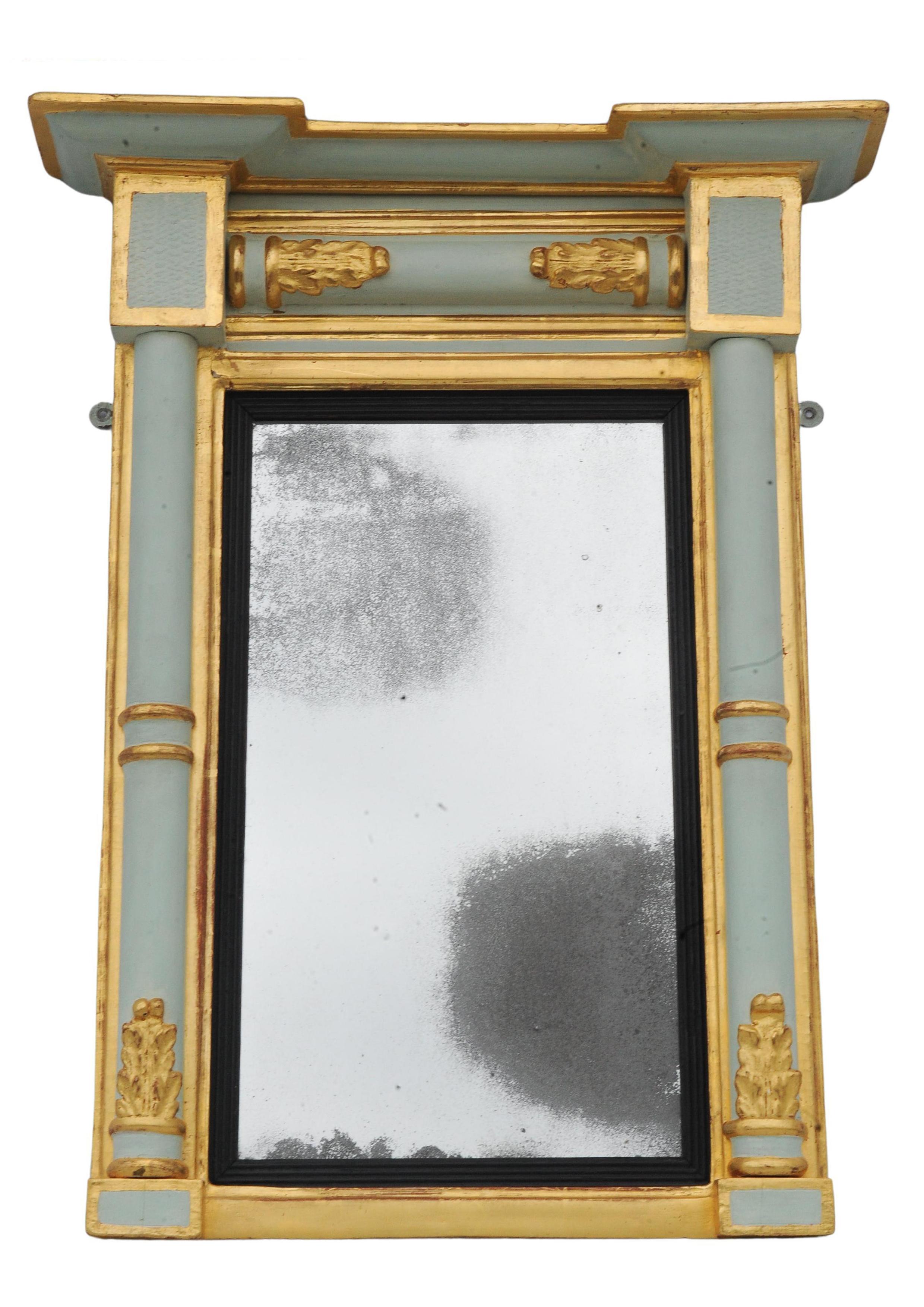 An Elegant Egyptian Revival 19th Century Pale Blue Hand-Painted and Parcel Gilt Pier Wall Mirror. 
Mirror face has heavy oxidisation.