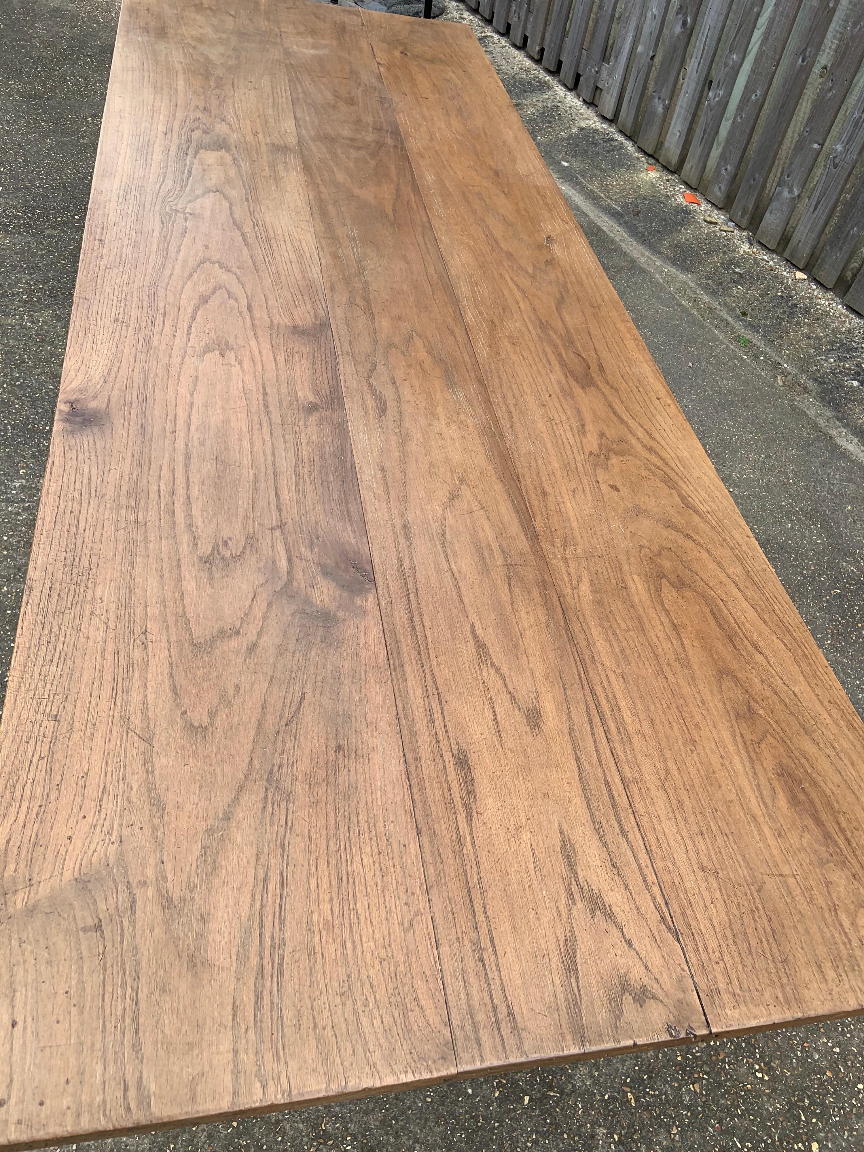 19th century elm farmhouse table with square legs and wide three plank top. Stunning color and patination.