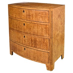 19th Century Empire Bow-Front Chest in Burled Olivewood and Ebony