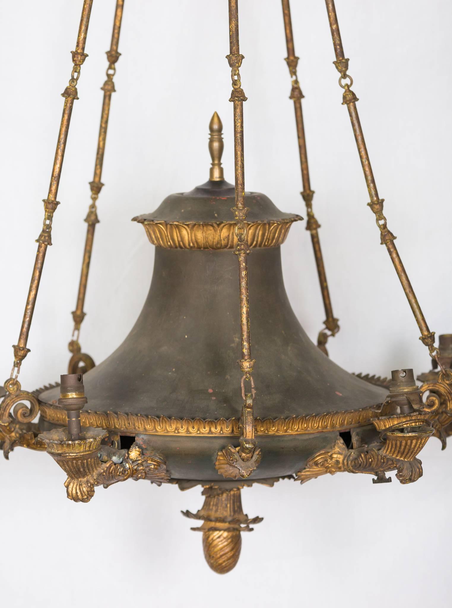 Exquisite early 19c Empire chandelier made out of two tones of bronze.