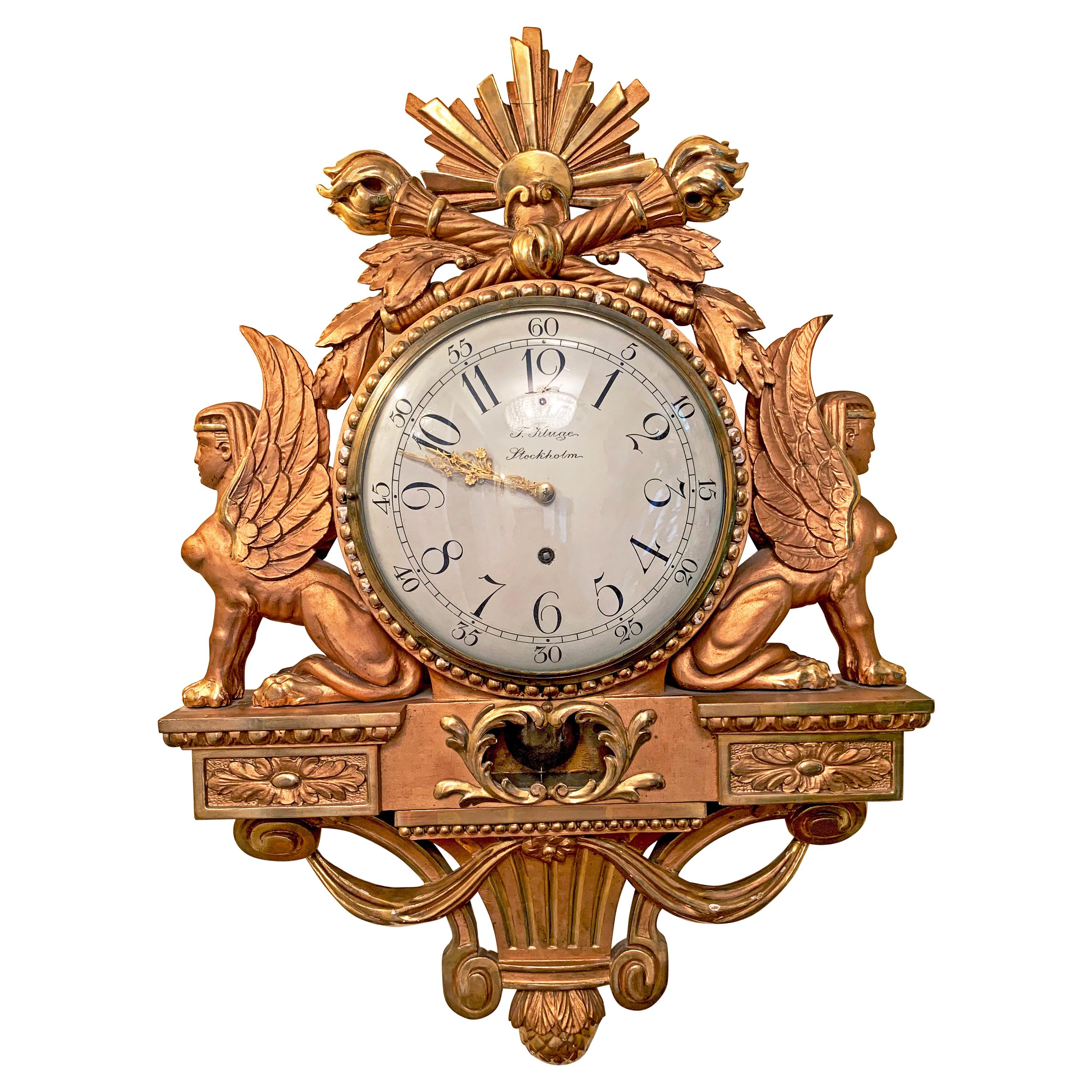 Horloge Empire du 19ème siècle en or T Kluge Stockholm avec sphinx de chaque côté en vente