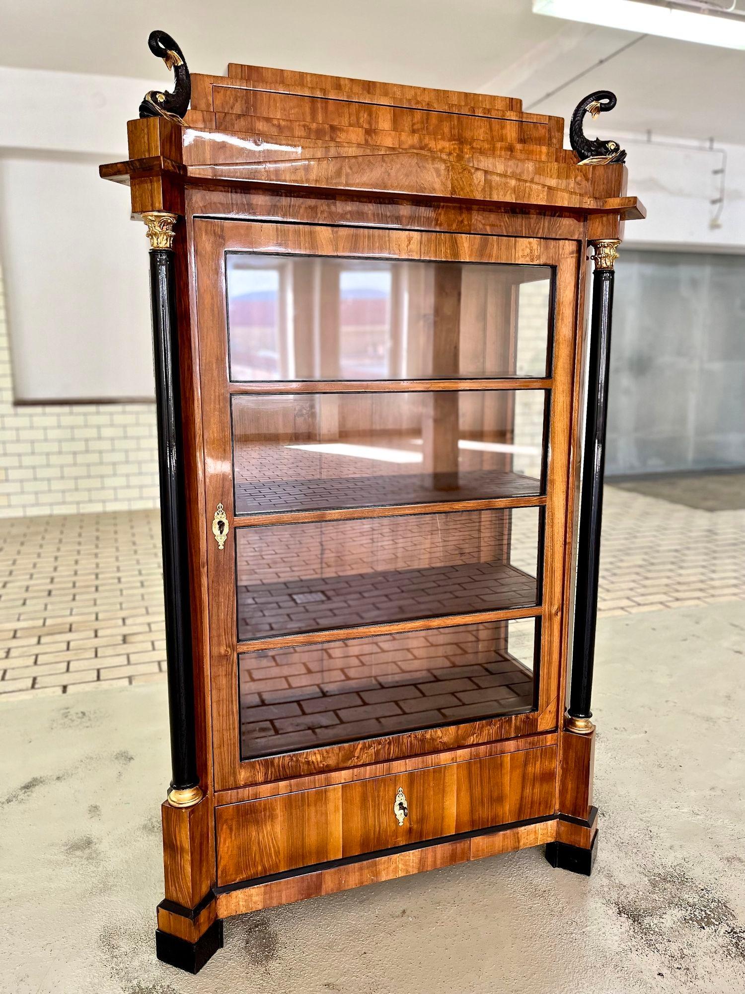 Exceptional, rare empire nutwood display cabinet or vitrine from the mid 19th century in North Germany - the 