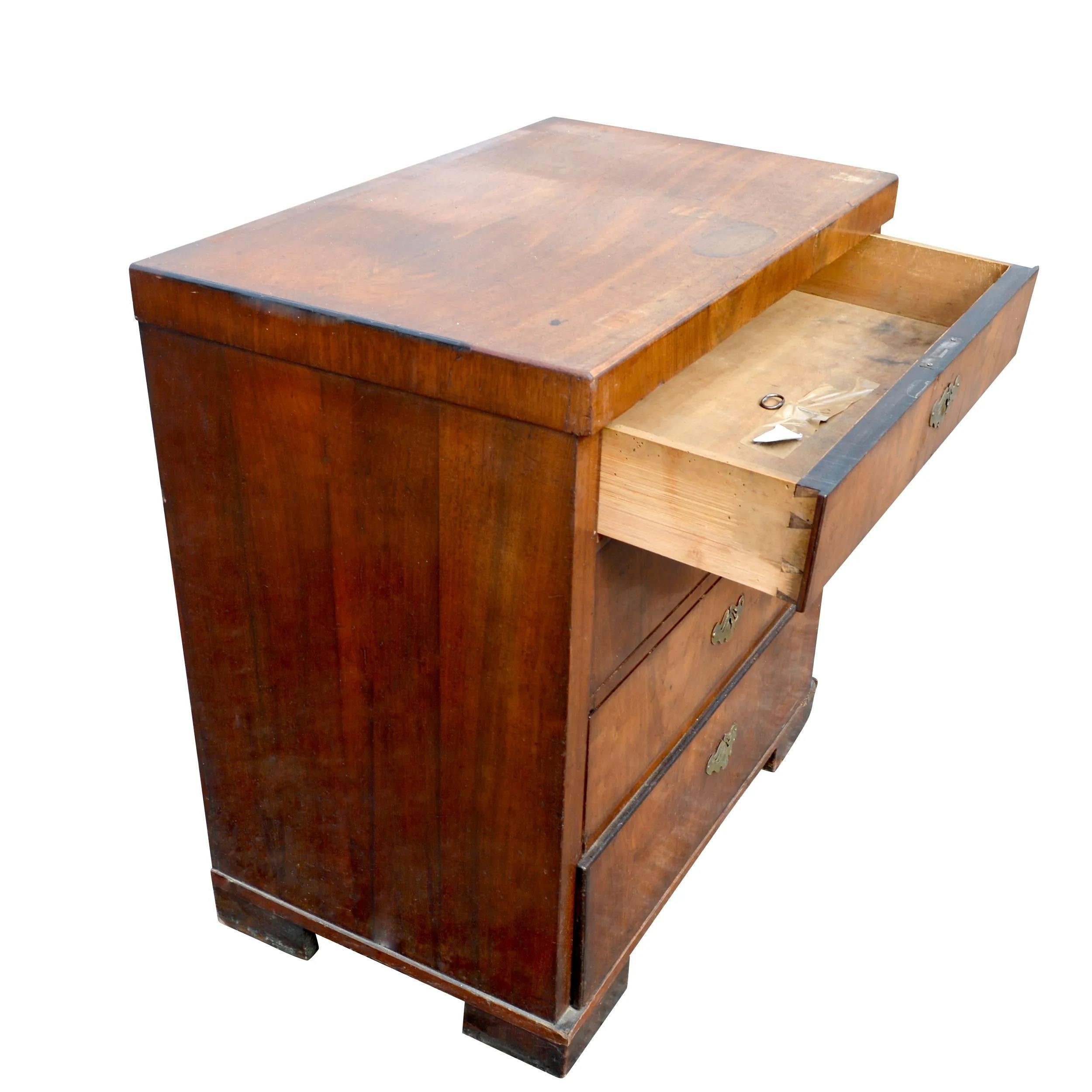This is a nice 19th century 4 drawer chest/commode constructed of mahogany with brass pulls. The dovetailed drawers are done by hand. The finish is it's original finish.
It's a great antique to have.