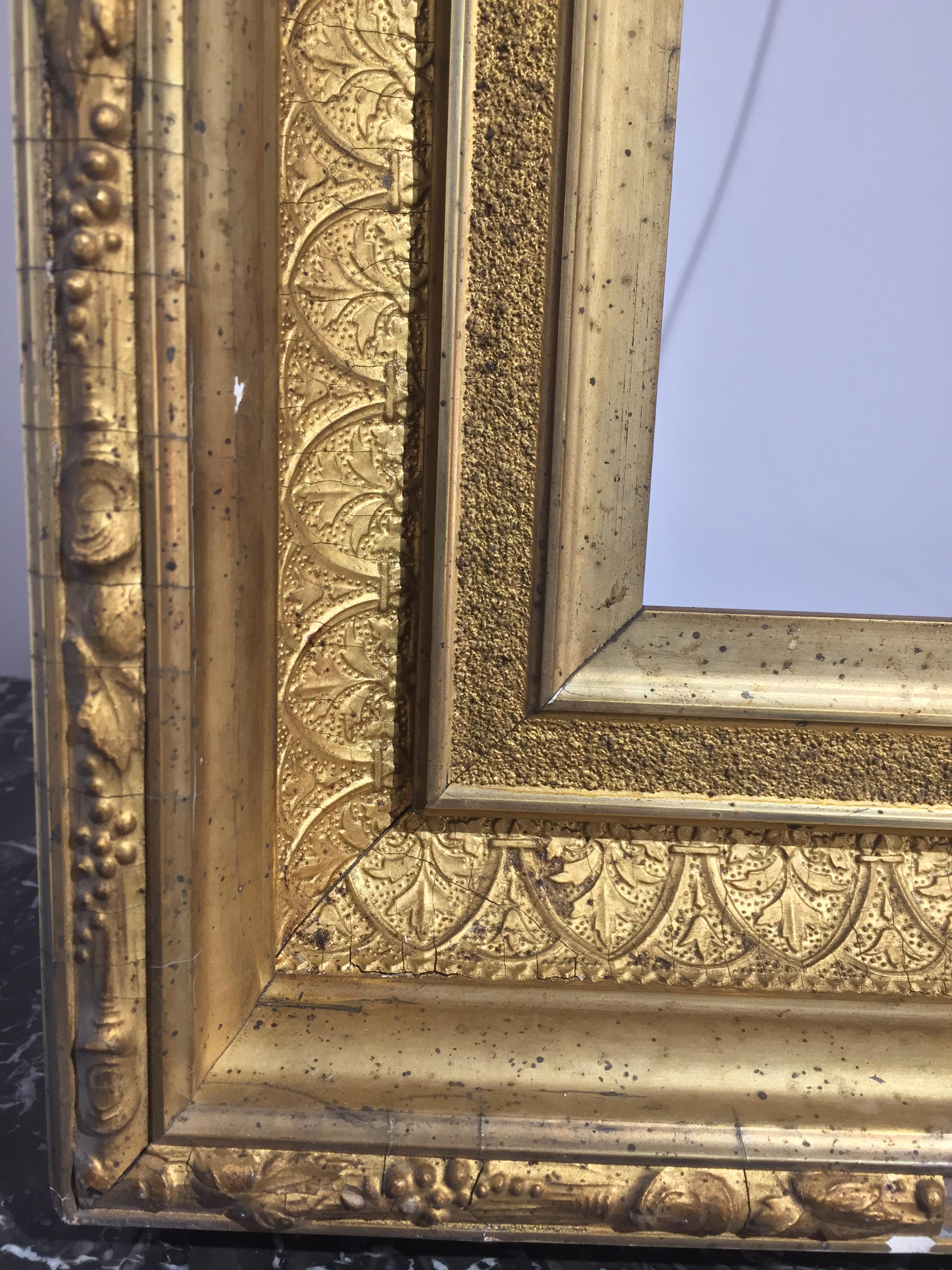 Early 19th century Empire wood an plaster French frame.