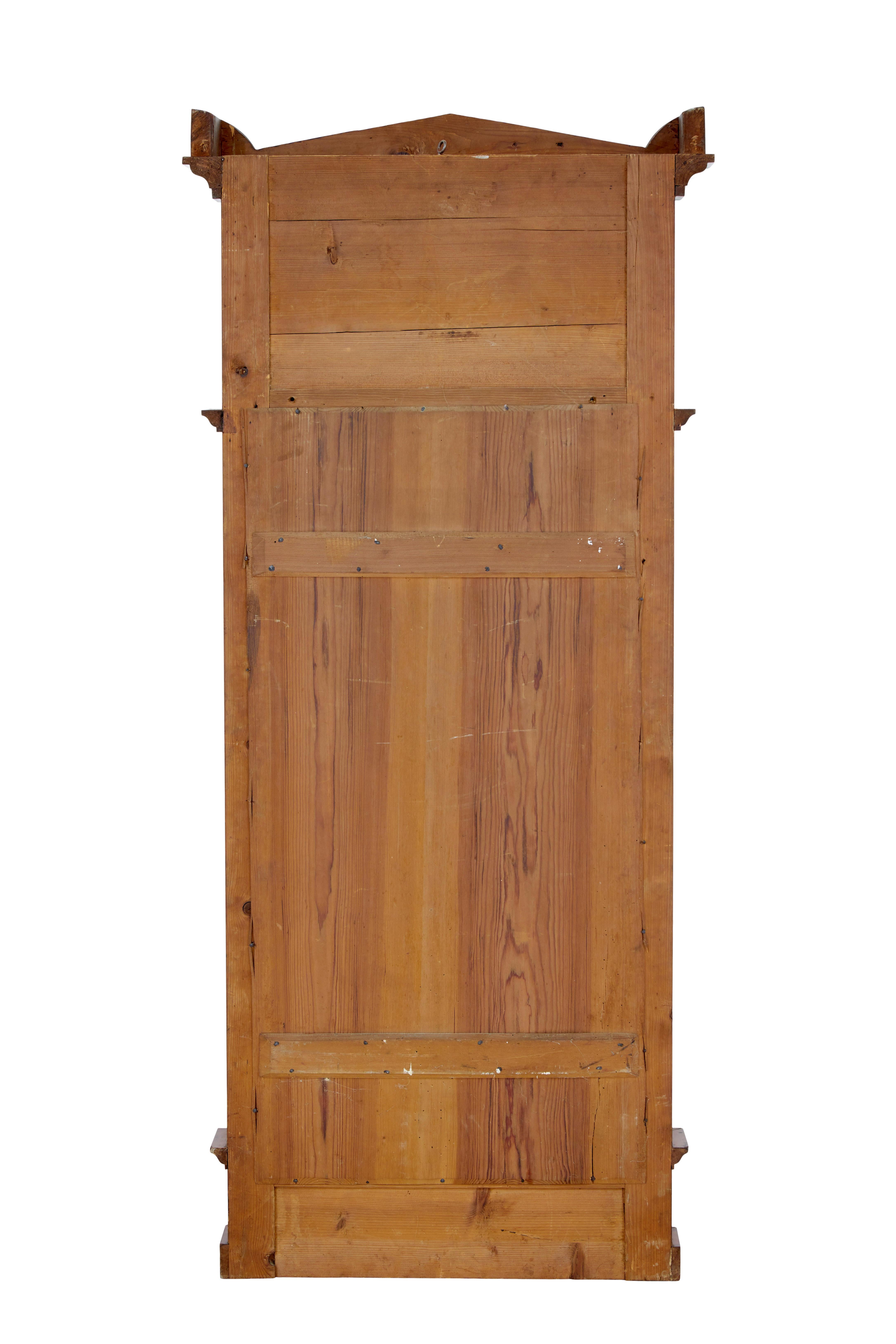 19th century empire revival mahogany pier mirror circa 1870.

Excellent quality pier mirror using the finest mahogany.  Architectural cornice top with cresent shape which showcases the flame mahogany to maximum effect. Central 2 part mirror flanked