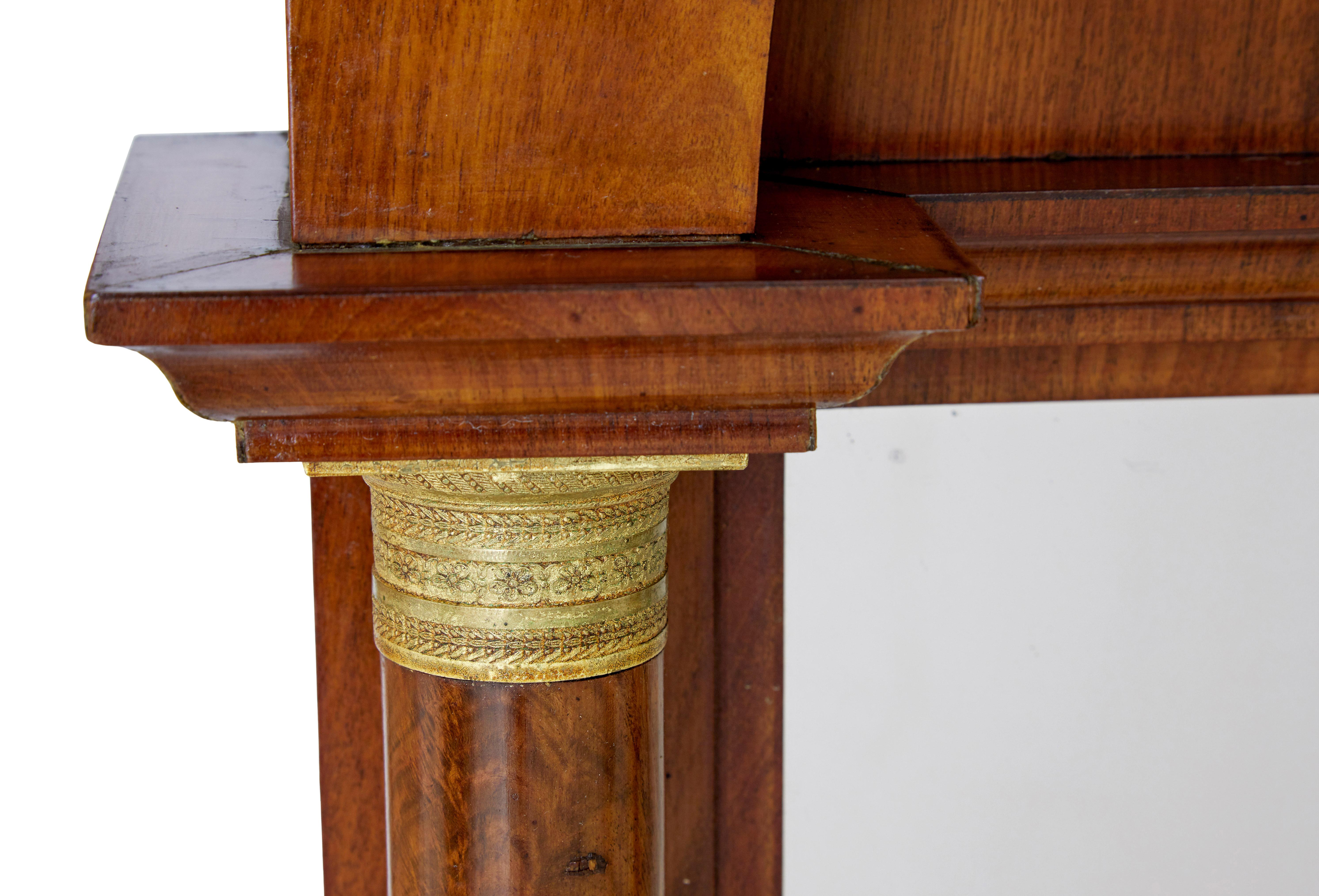 Glazed 19th Century empire revival mahogany pier mirror