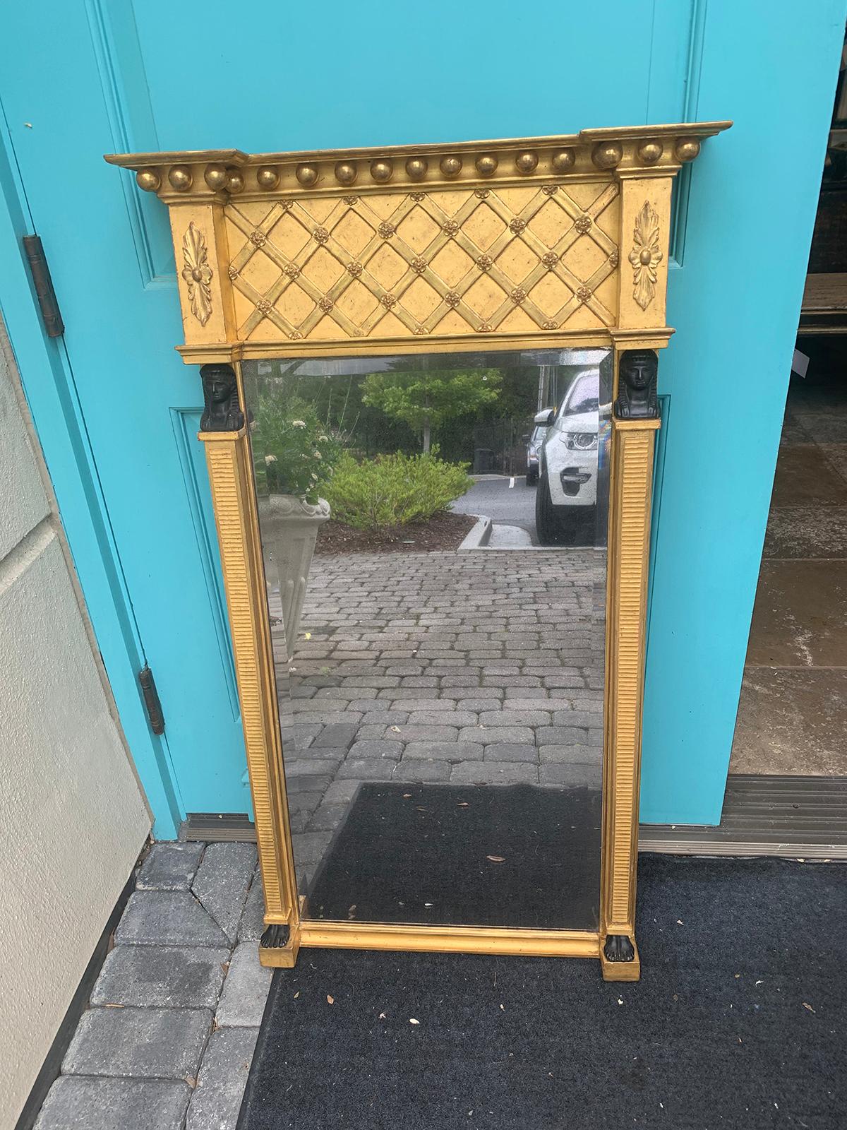 19th century Empire style giltwood mirror with carved faces
Overall: 25.25