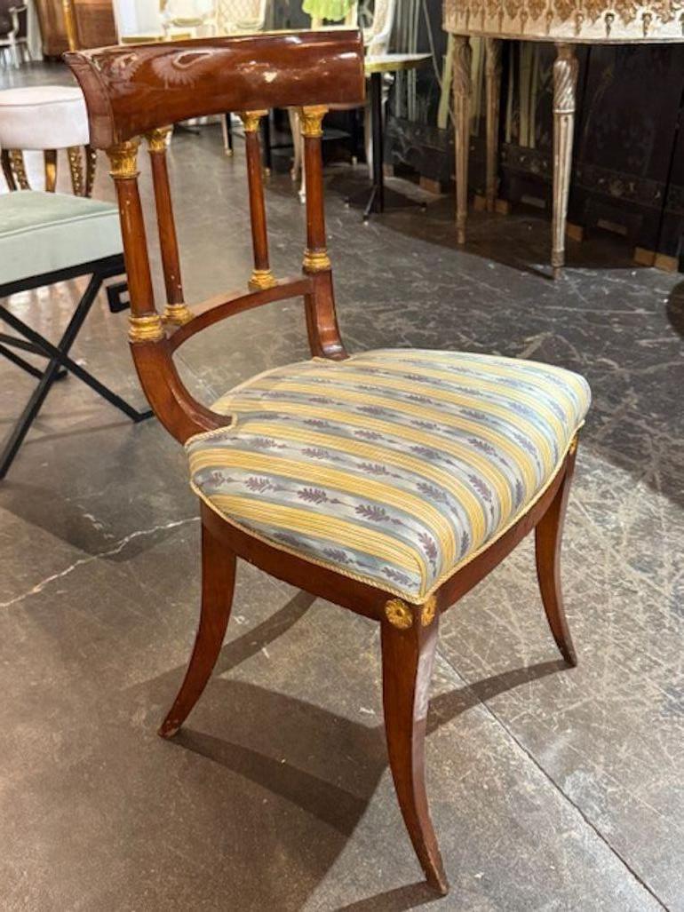 Acajou 19th Century Empire Style Mahogany and Gilt Side Chair en vente