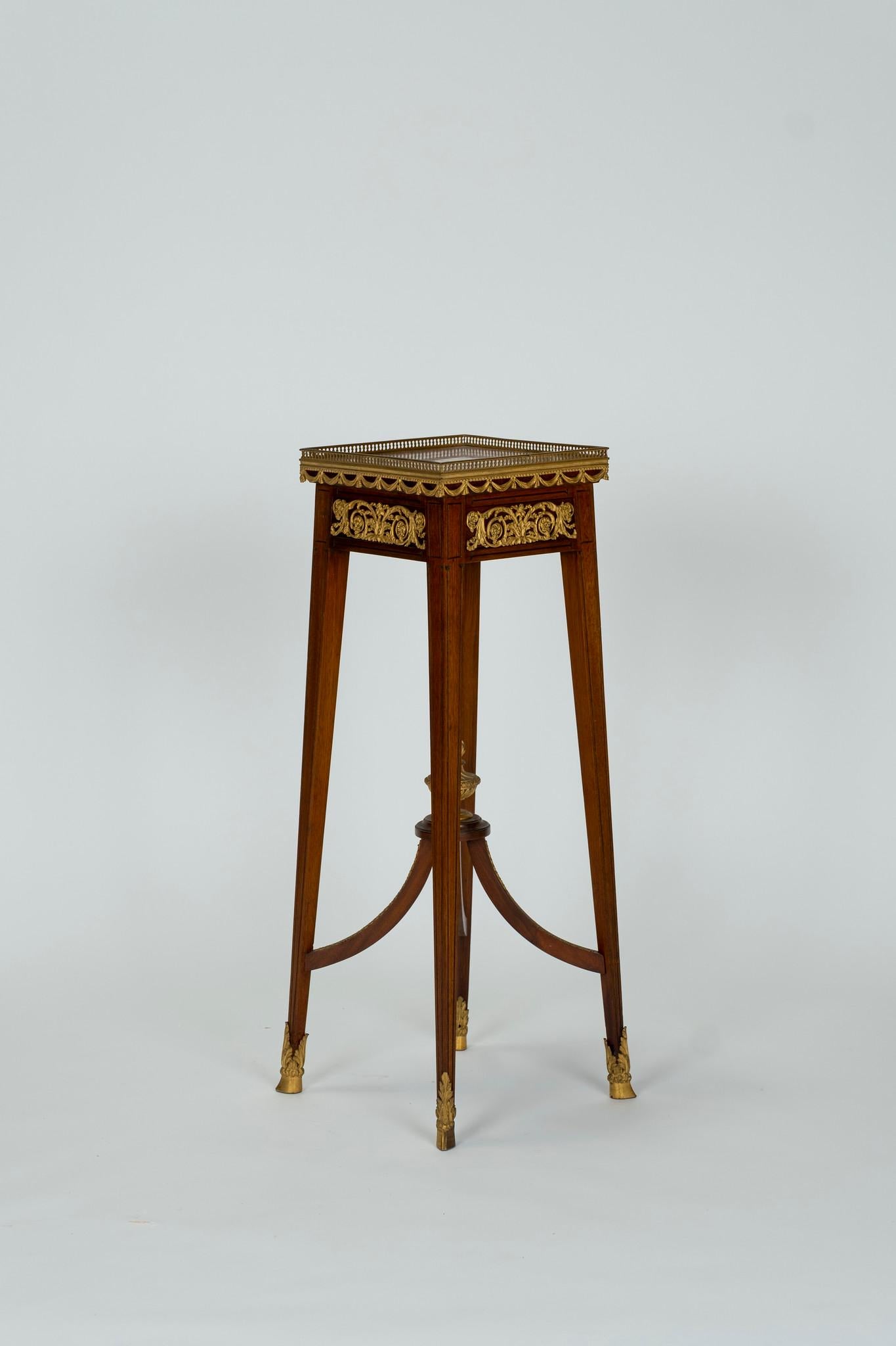 19th Century French Empire mahogany table stand with bronze ormolu and marble top.