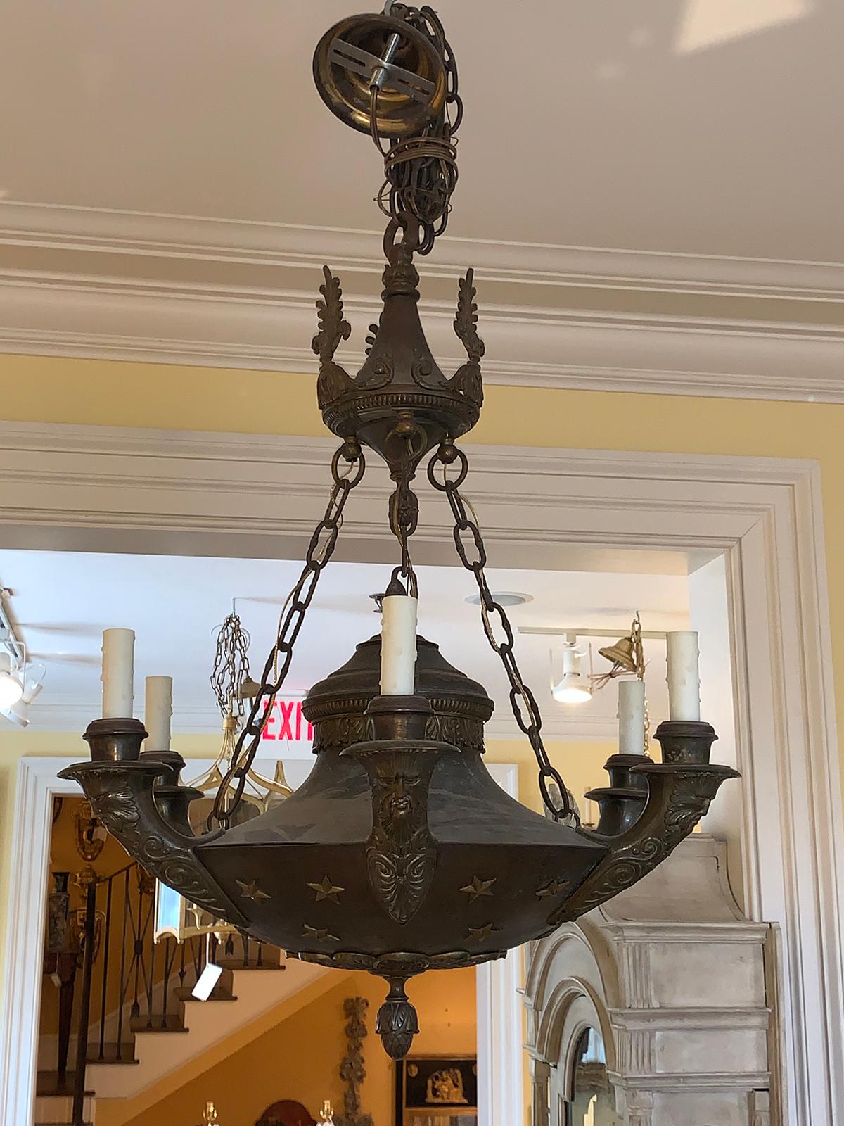 19th century Empire style six-arm chandelier with faces
New wiring.