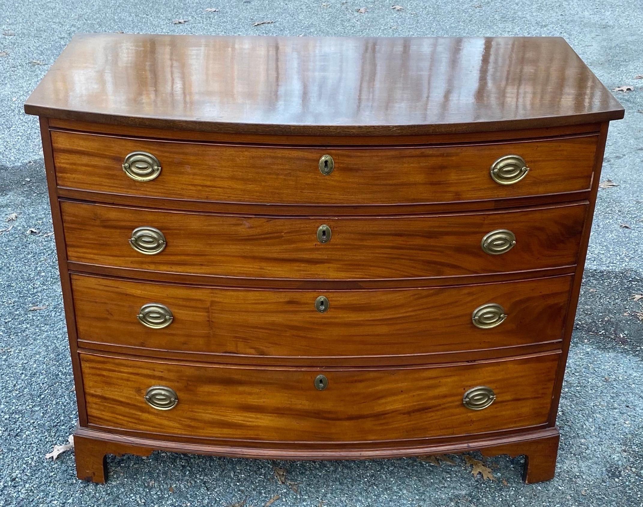19th Century English 4-Drawer Bowfront Chest of Drawers with Figured Mahogany In Good Condition For Sale In Charleston, SC