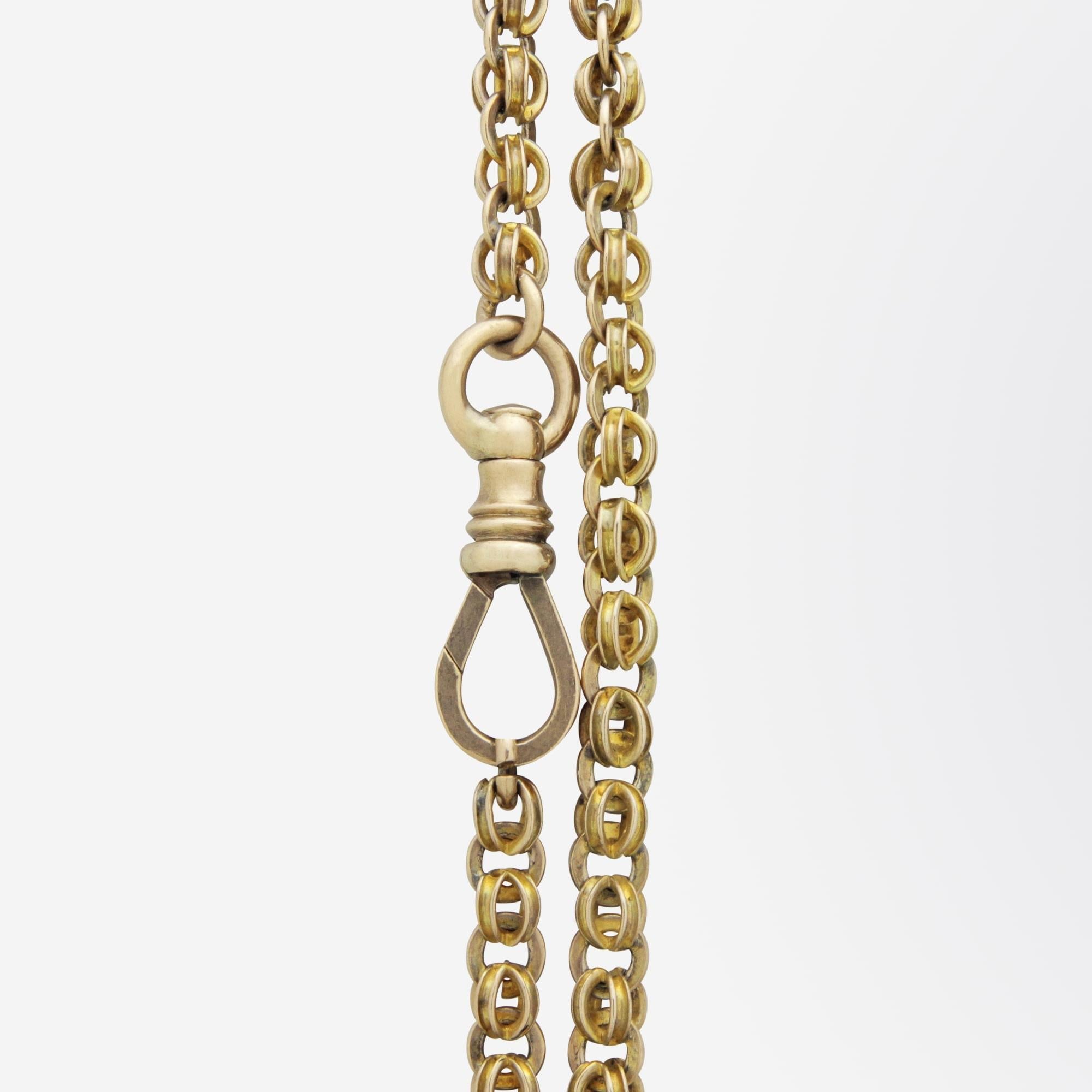 Oval Cut 19th Century, English, 9 Karat Yellow Gold Muff Chain with Slider Pendant For Sale