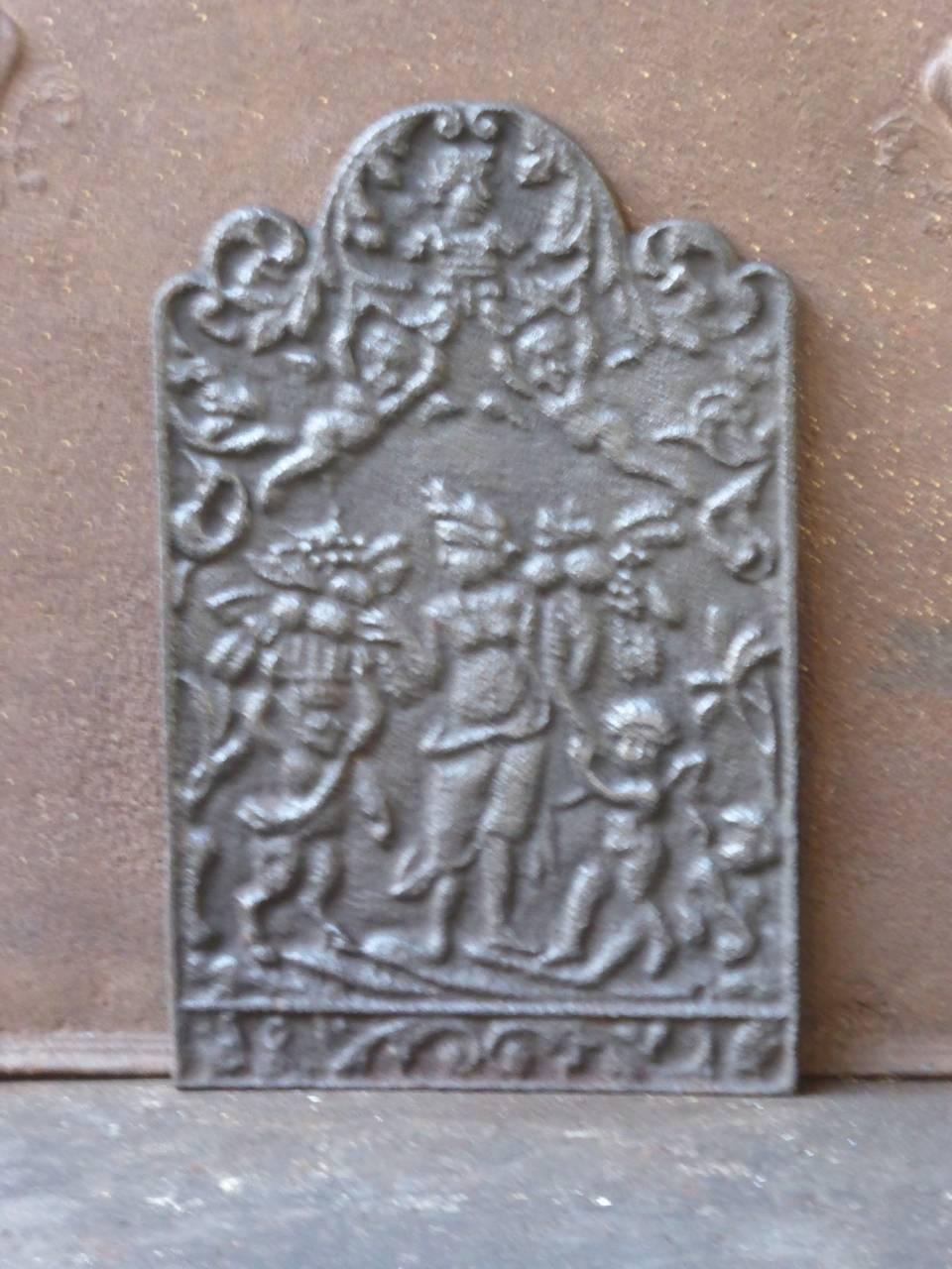 19th century English fireplace fireback with an allegory of Peace.

We have a unique and specialized collection of antique and used fireplace accessories consisting of more than 1000 listings at 1stdibs. Amongst others, we always have 300+