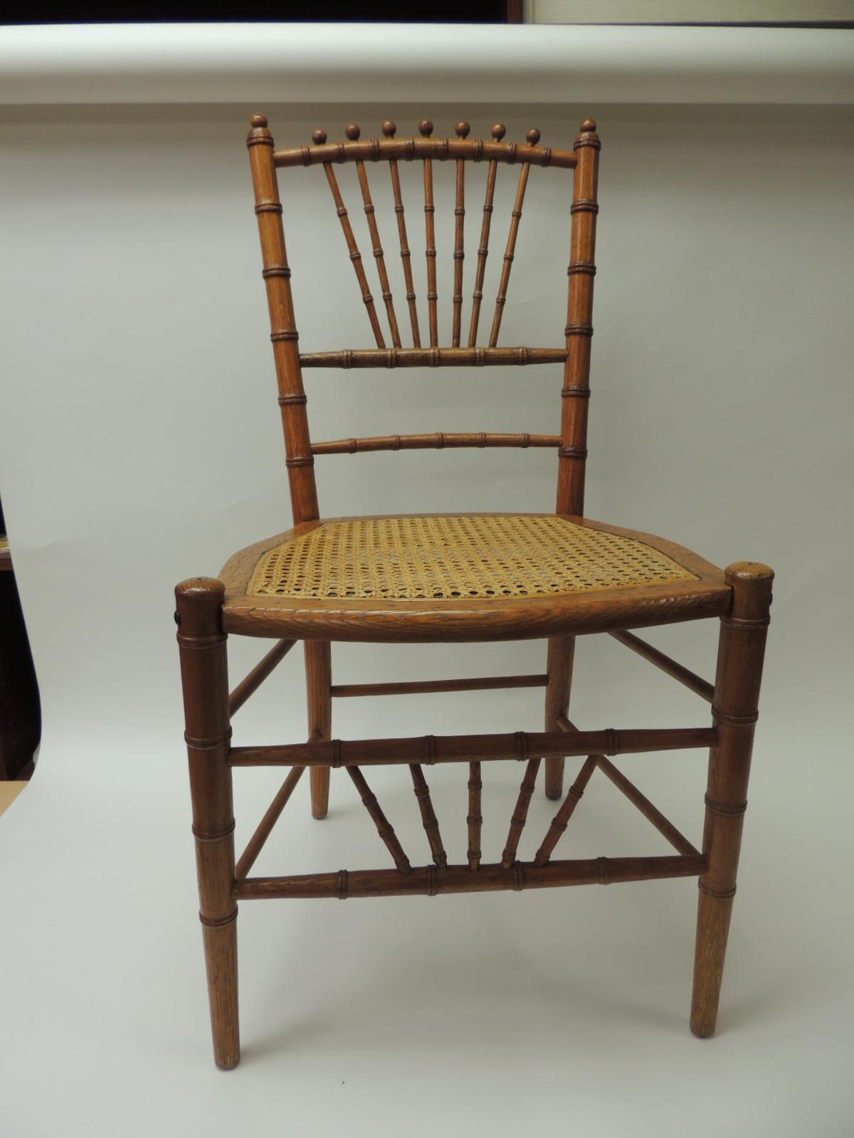 English 19th century bamboo and rattan ballroom chair bamboo, rattan and 
Honey color, faux bamboo side chair with original caning seat
Size: 17 W x 16 D x 32 BH x 15 D x 16.5 SH
Note: The chair is in excellent condition and very sturdy; pair