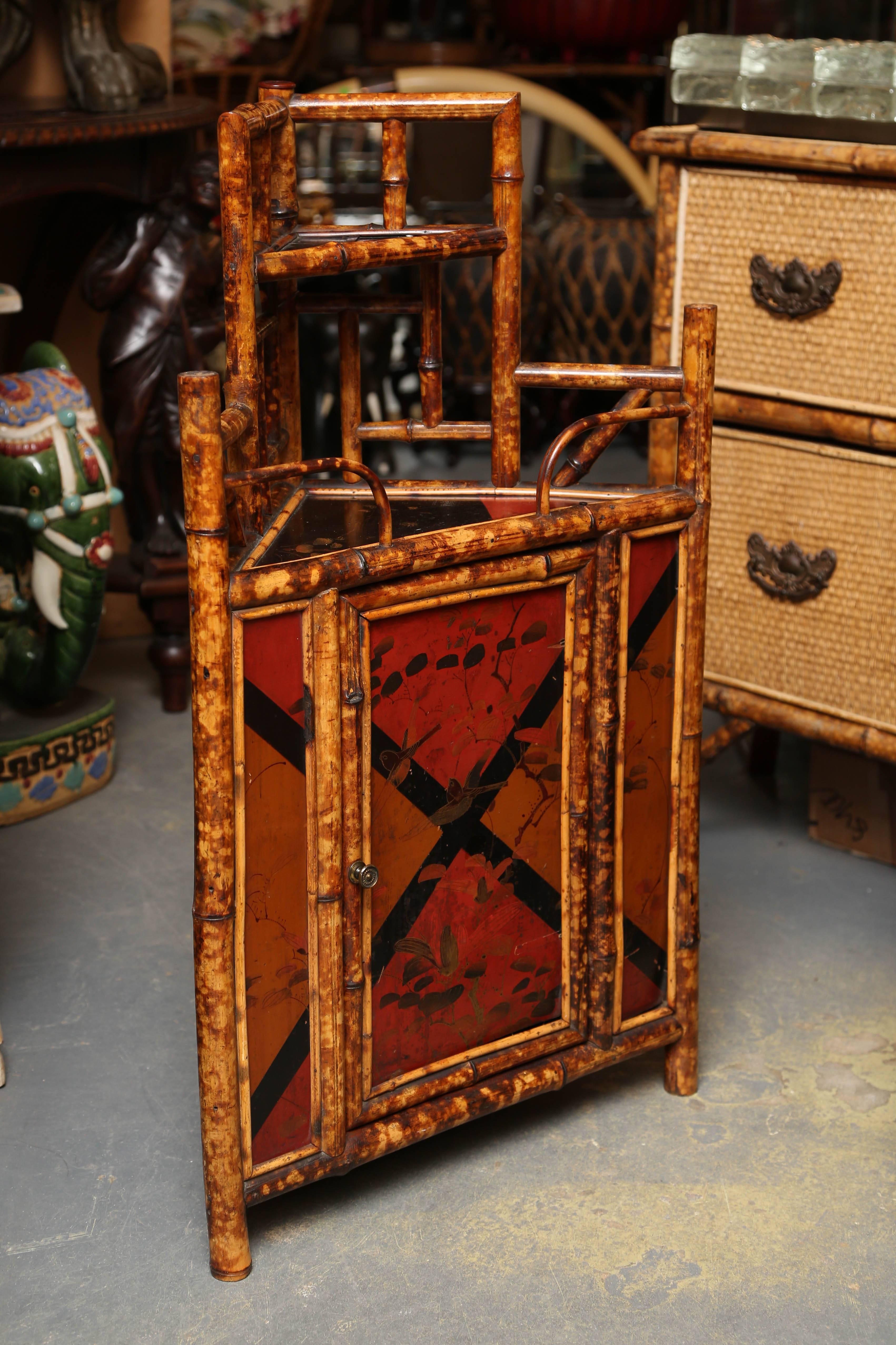 A fine Edwardian corner piece appointed with red lacquer panels. Good design and
proportions.


 
