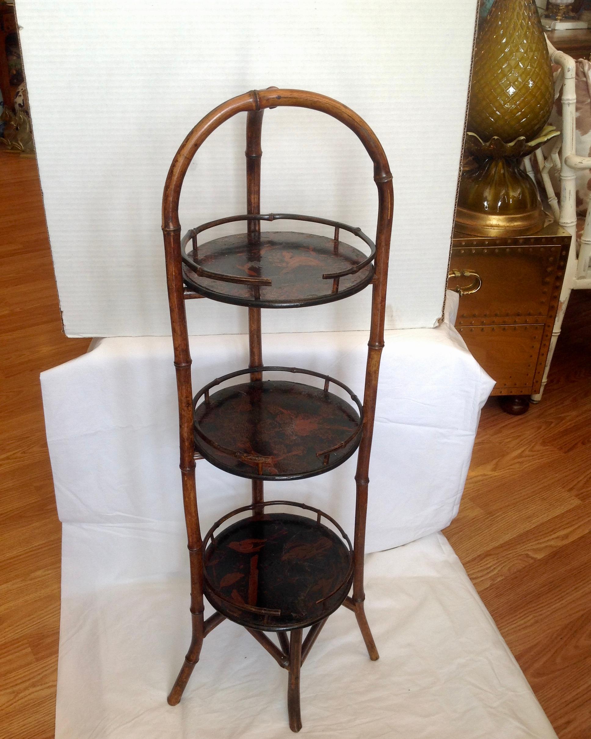 A desirable petite étagère or chair side stand - nicely detailed and appointed.