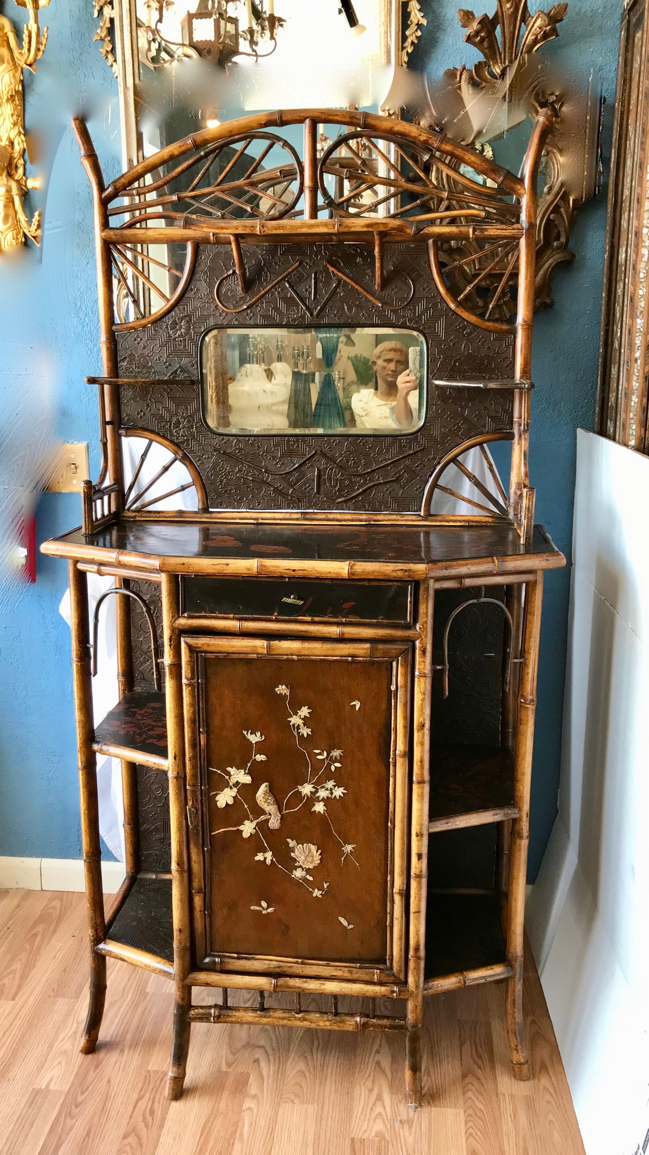 A superb example - finely detailed. Magnificently proportioned.
The cabinet is designed with an etagere top that is richly embellished.
The front door is appointed a bird foliage. An outstanding creatively 
Appointed piece. Superior quality.