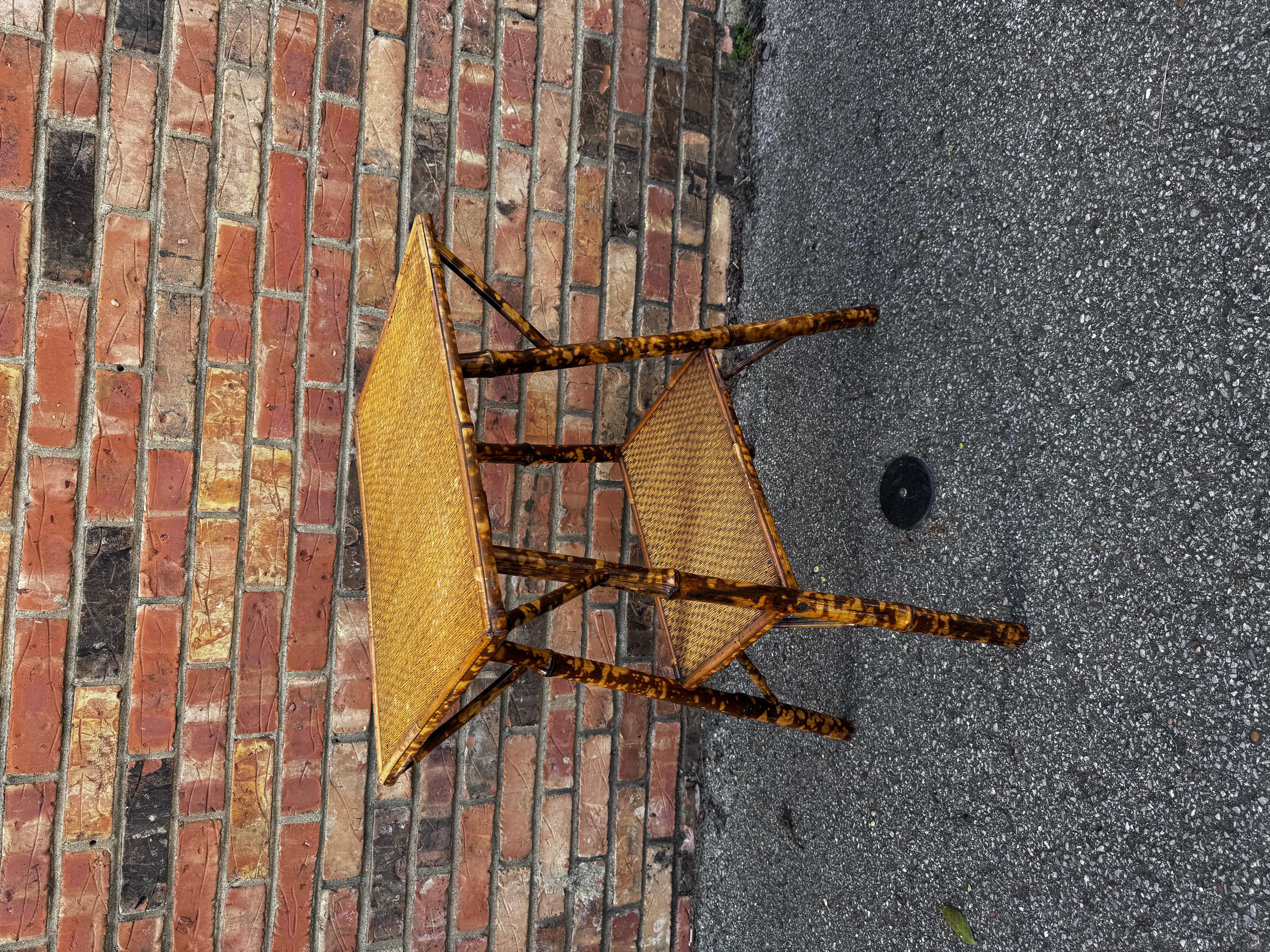 This is a beautiful 19th century English bamboo side table! Tables like these make excellent accent pieces because their color and style is so versatile.. These tables fit wonderfully into almost any room! 

Dimensions
20ʺW × 14.5ʺD × 26ʺH
