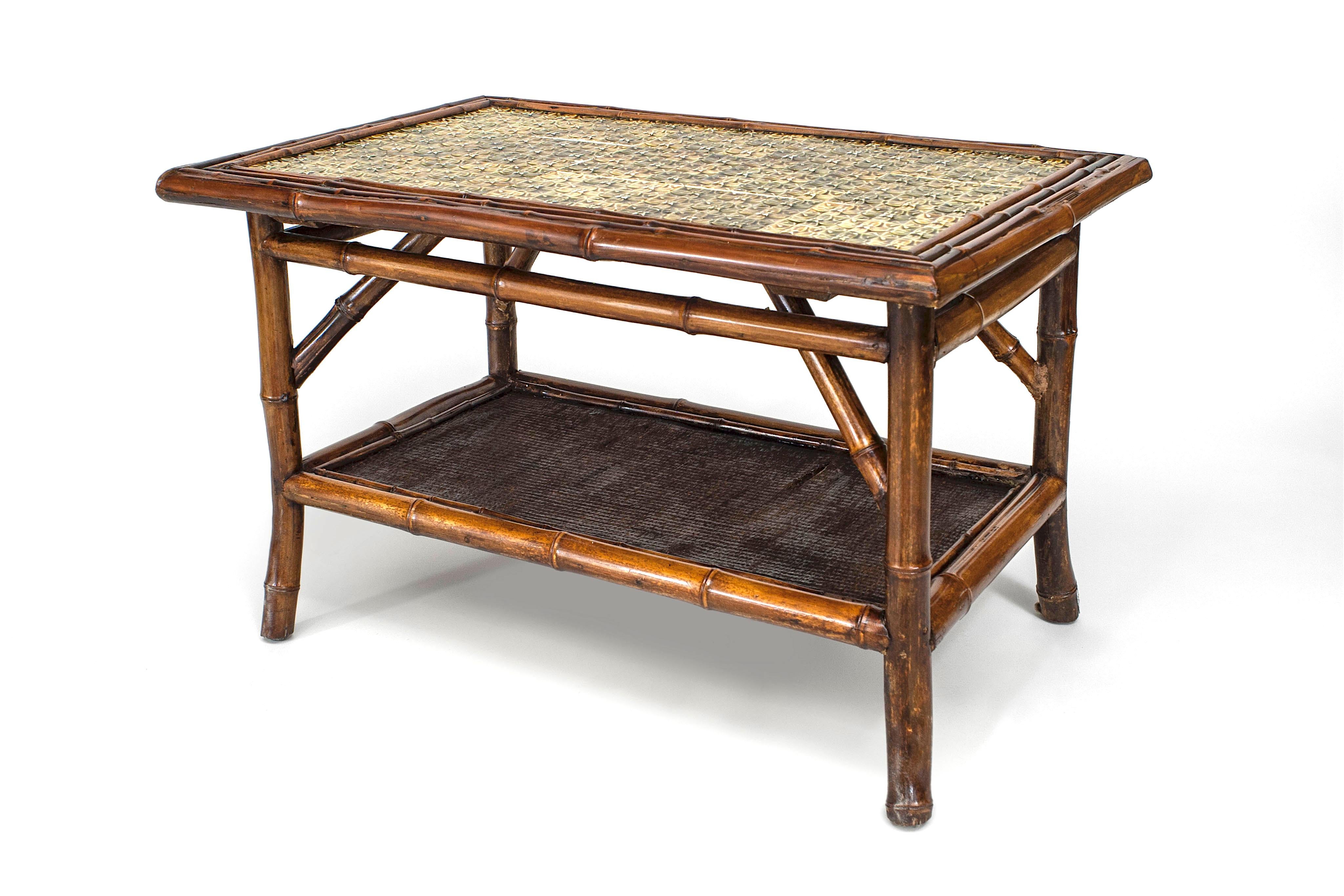 English Bamboo (19th Century) rectangular coffee table with a green tile top and a rush covered lower shelf.
