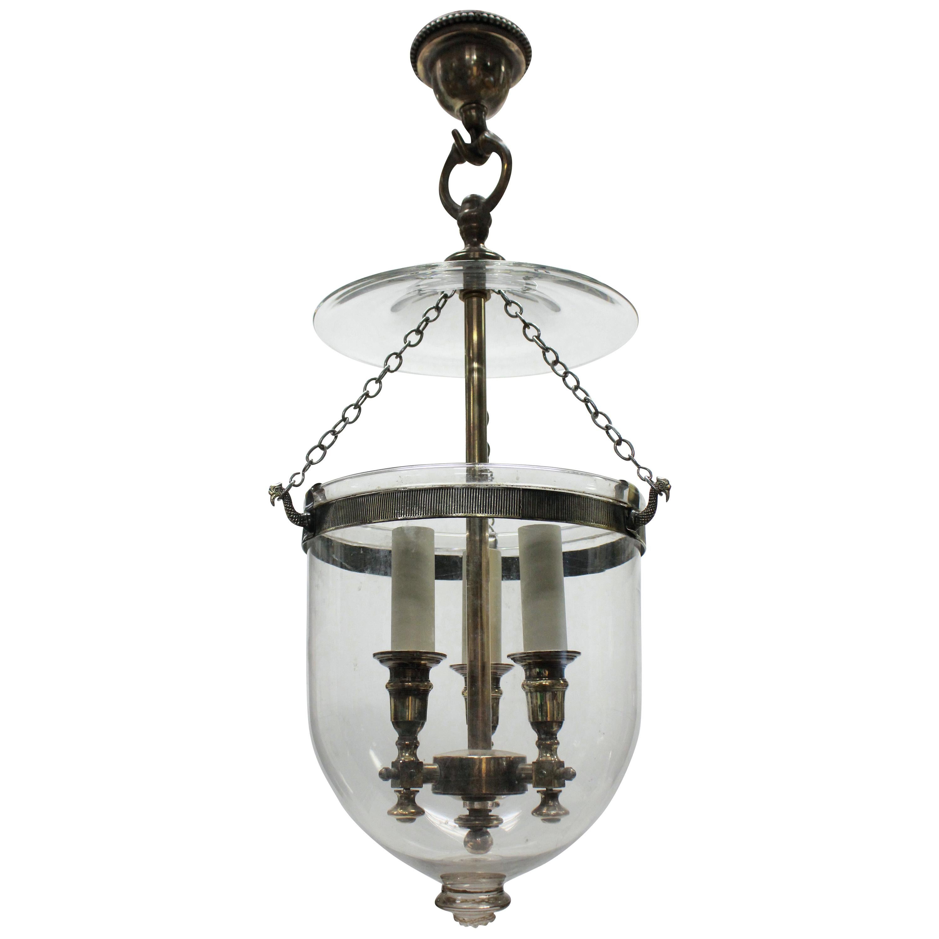 An English Regency style silver plated and glass hanging lantern.
