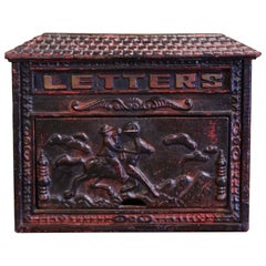 19th Century English Black Painted Cast Iron Wall Mailbox with Relief Decor