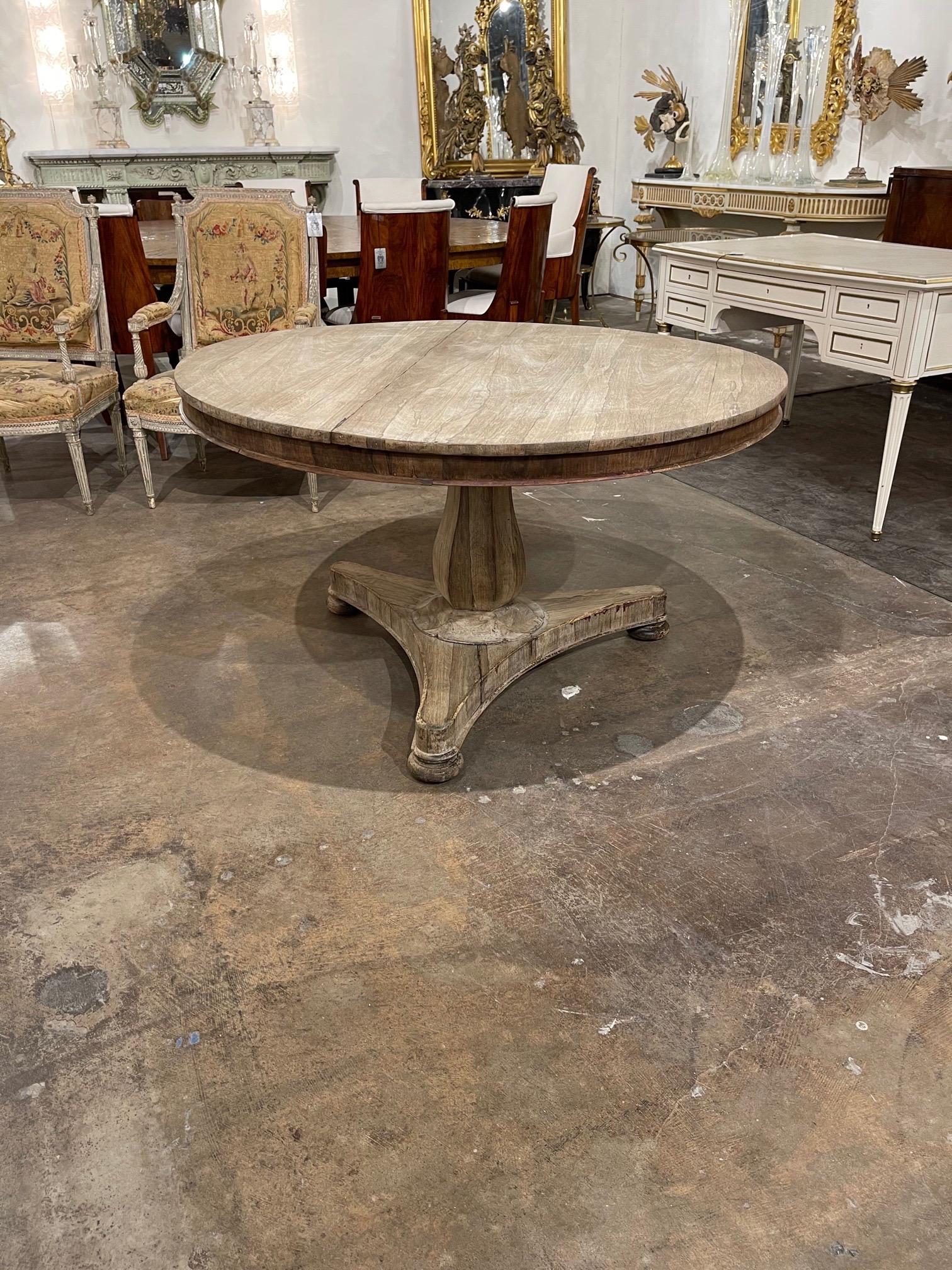 Beautiful 19th century English bleached rosewood center table. This stately table is perfect for a more rustic look. Fabulous!